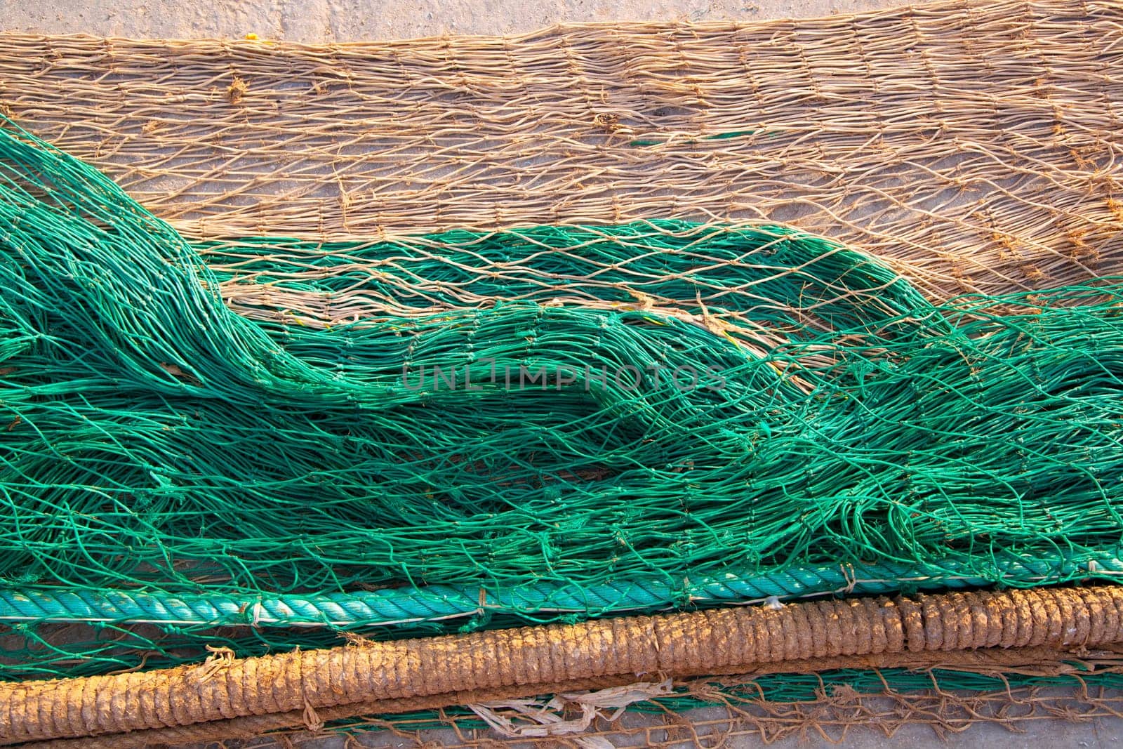 fishing nets texture pattern over soil in green and beige colors