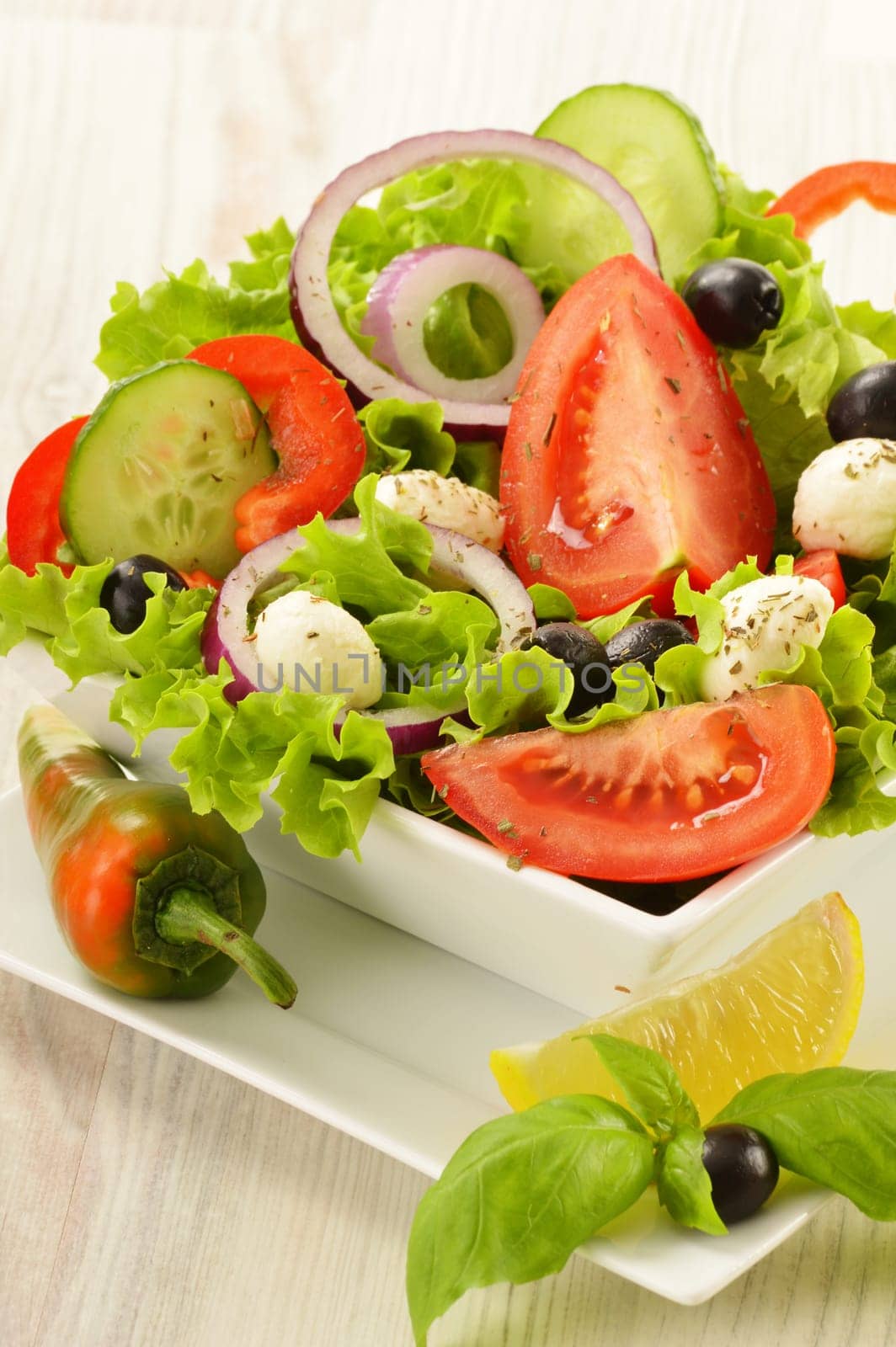 Composition with vegetable salad bowl