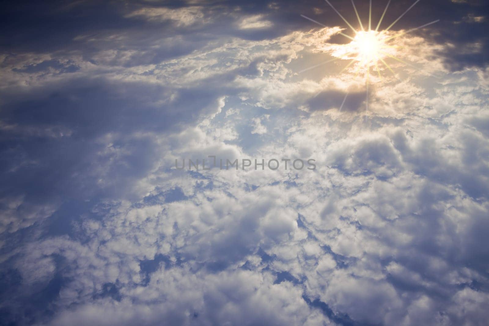 Blue sky with clouds and sun for adv or others purpose use