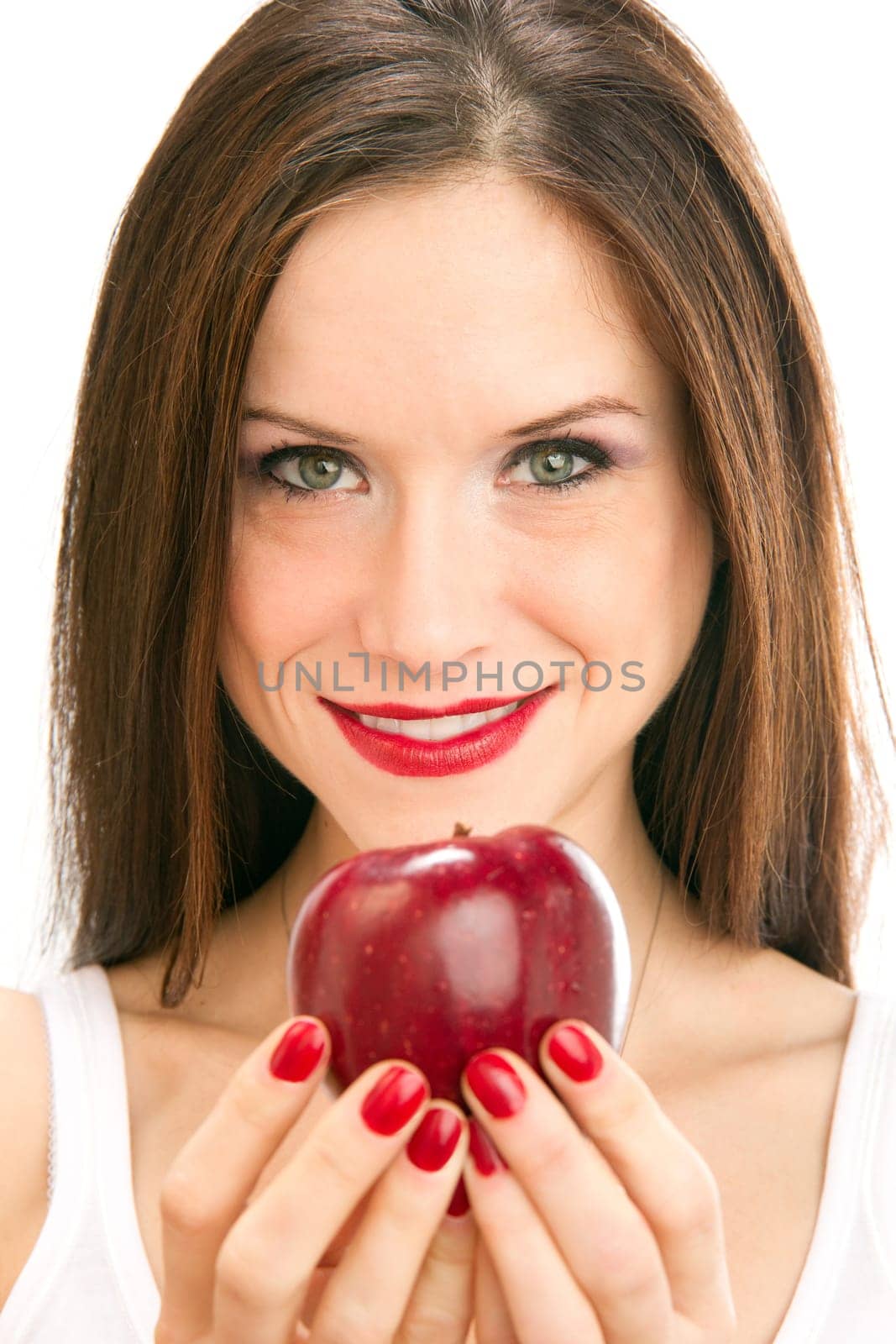 Beautiful Woman holds a Red Delicious Apple