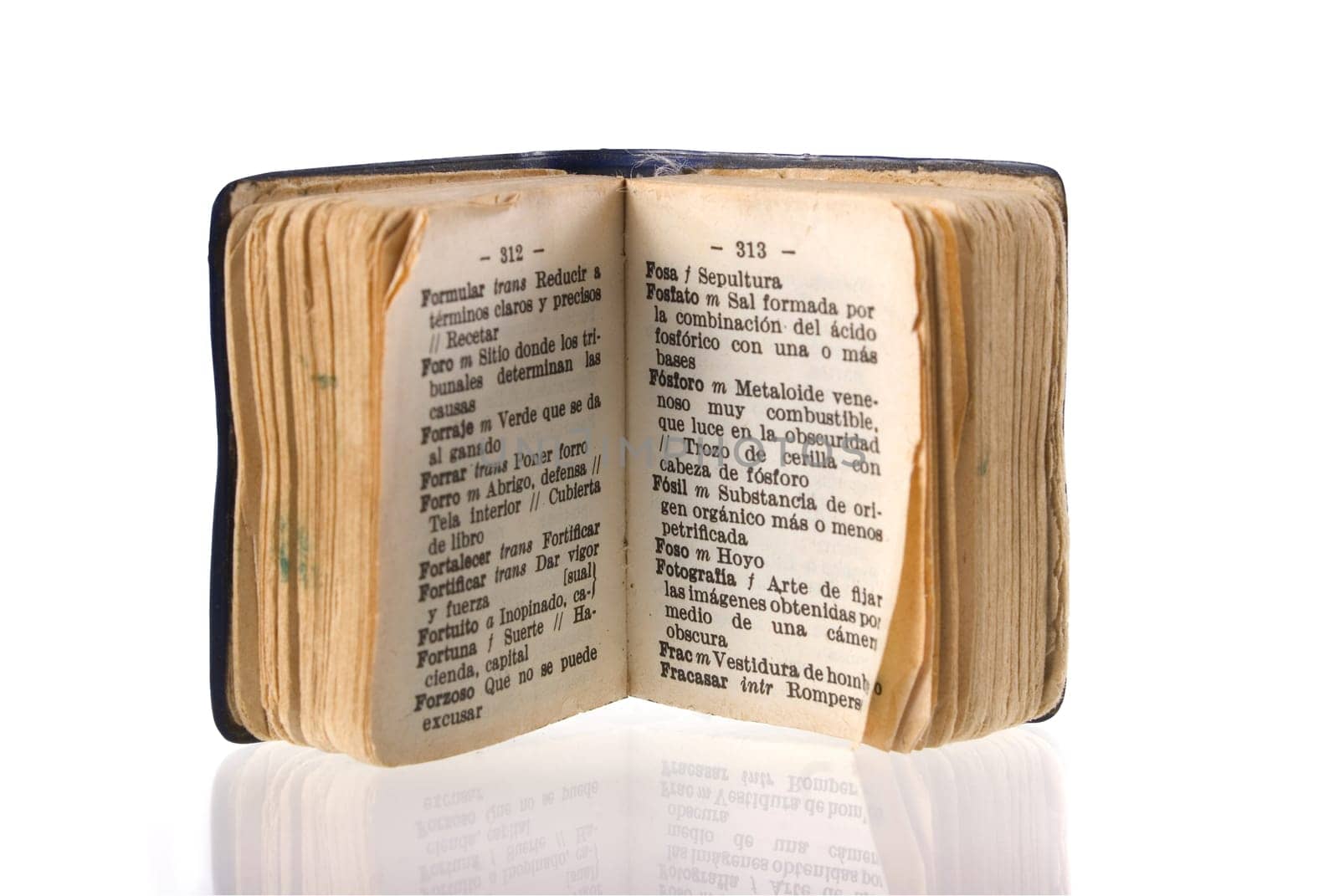 Spanish dictionary focused on photography word with its reflection on white background.  Included clipping path, so you can easily cut it out and place over the top of a design.