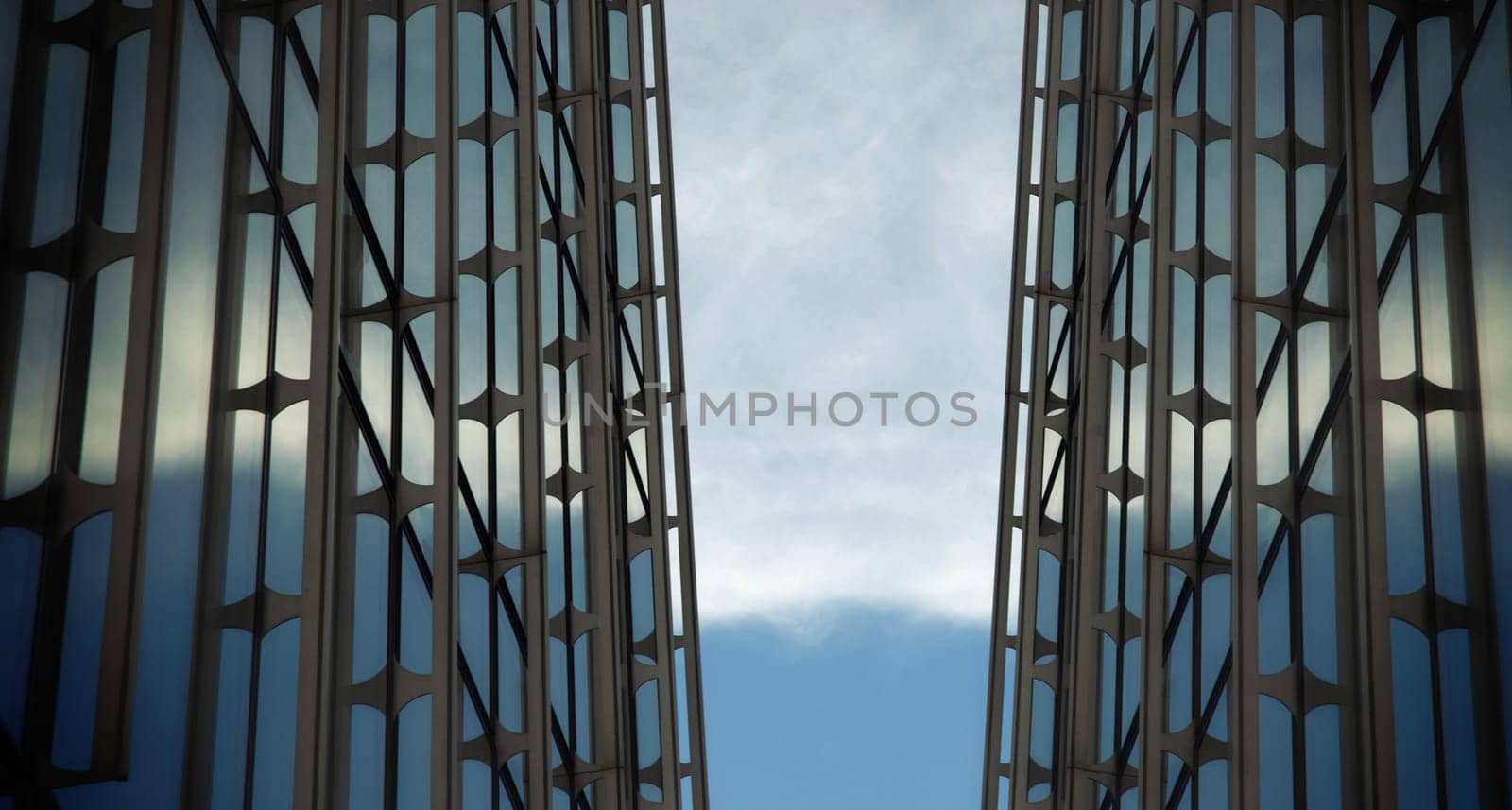 Technologic background with metallic structure and a sky partially clear.
