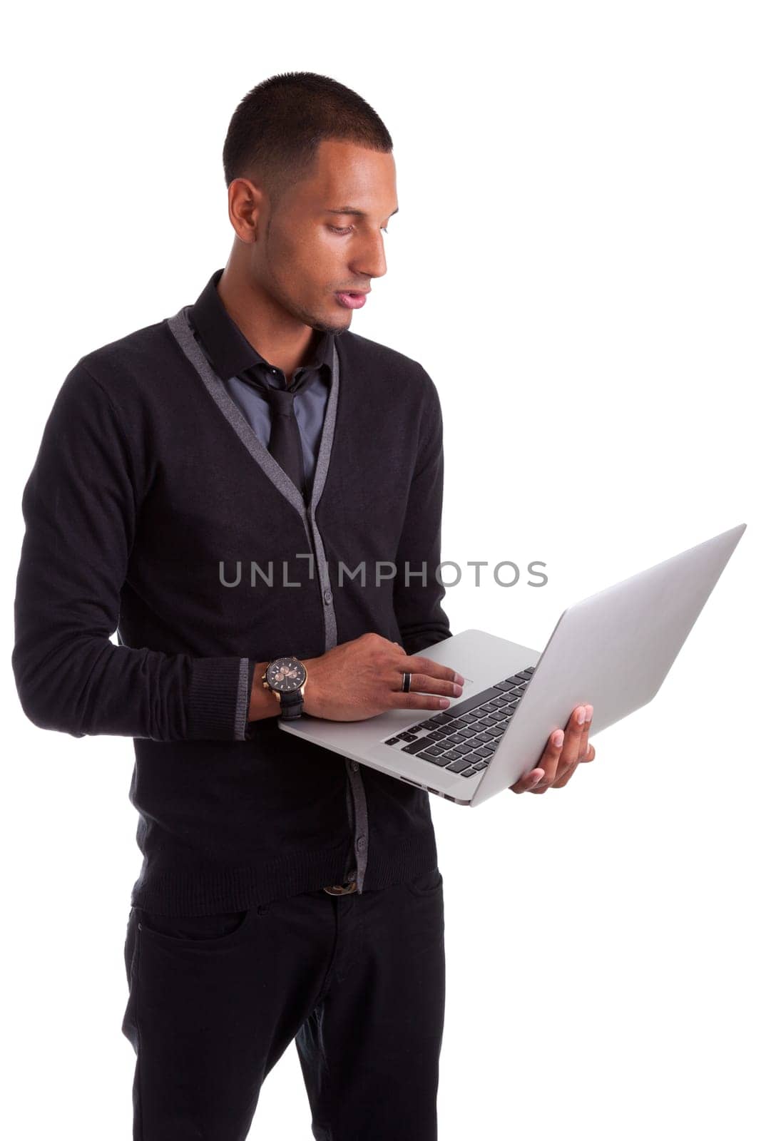 Young african american man using a laptop, isolated on white background