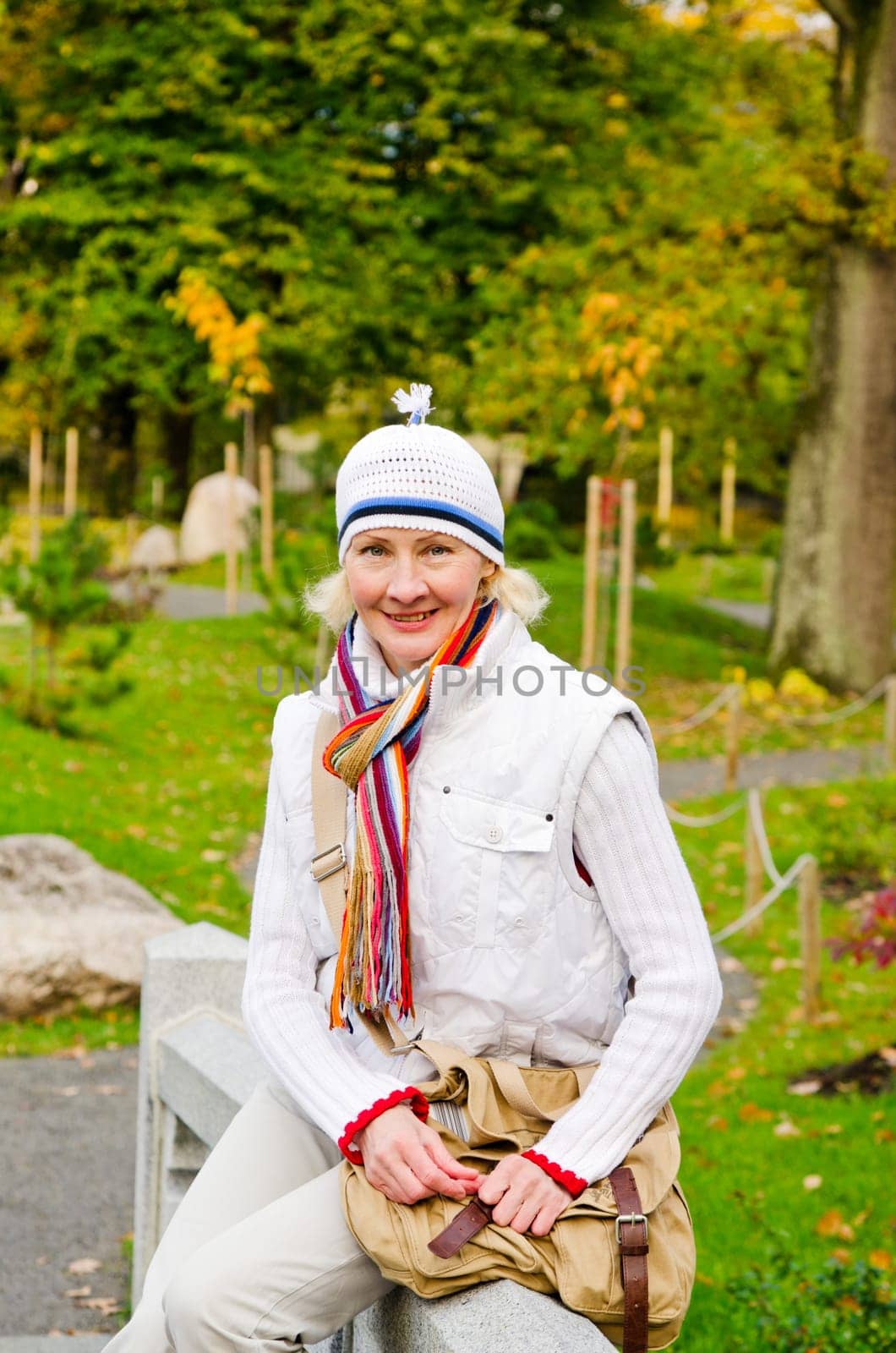 Portrait of a mature woman in the autumn  park