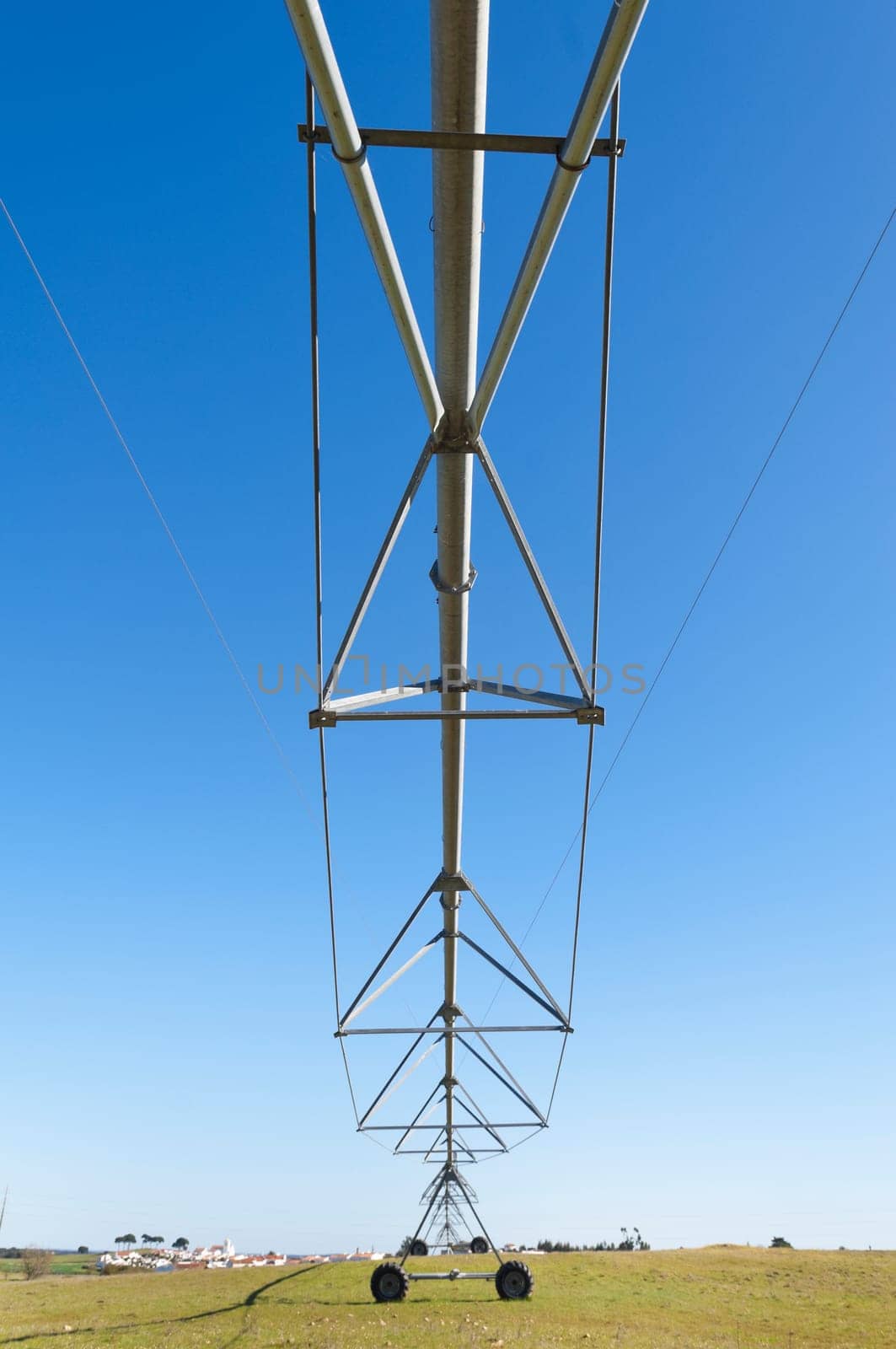 Irrigation pivot resting in a grass field of Alentejo, Portugal