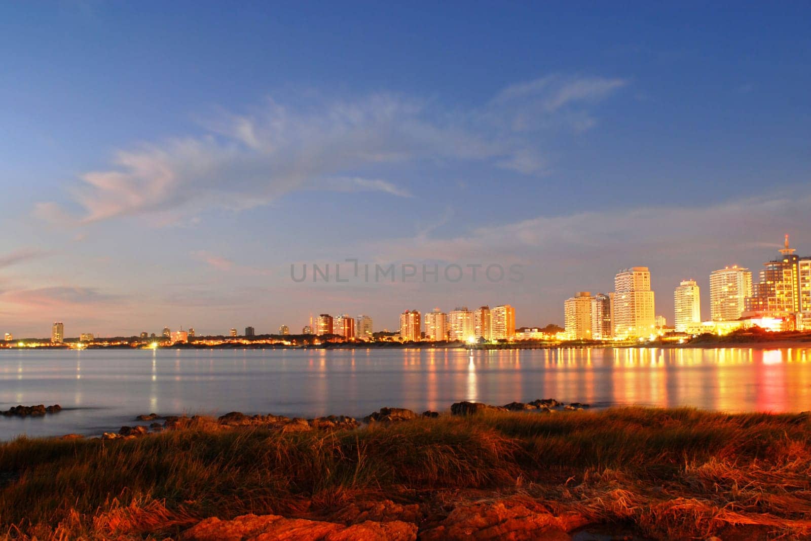 Golden sunset at Punta del Este seashore city. Uruguay.