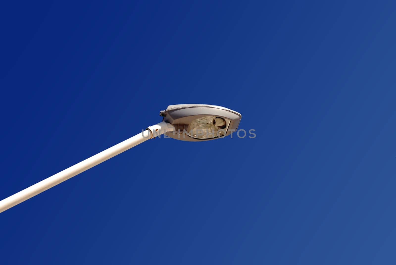 Single column light on blue sky background