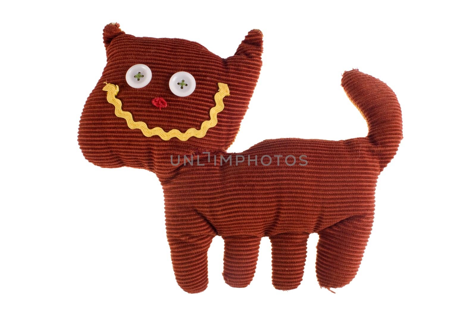 One smiling fabric teddy cat isolated with on white background.  Included clipping path, so you can easily cut it out and place over the top of a design.