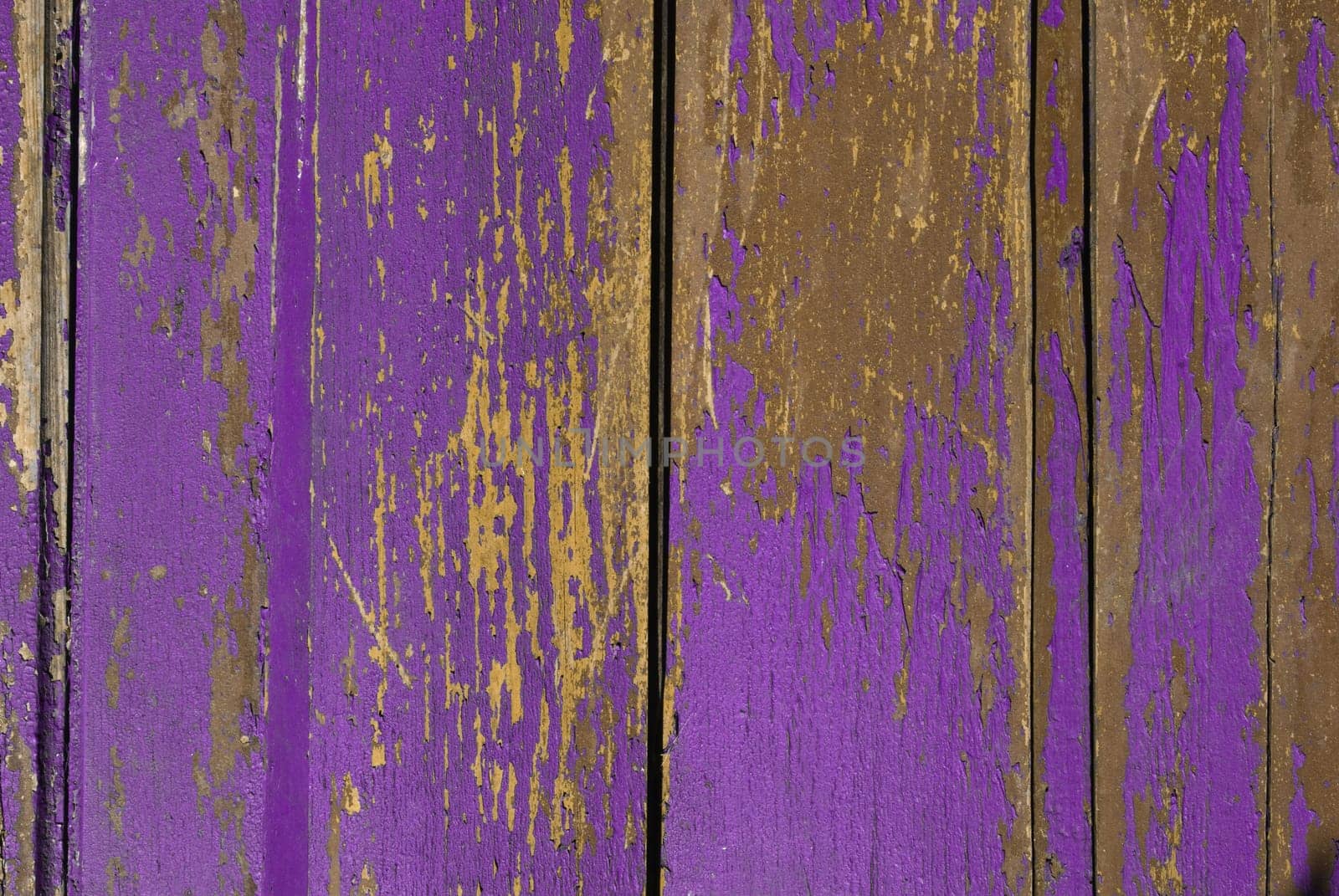 Vintage wooden texture with grunge paint close up. Useful as background for design works.