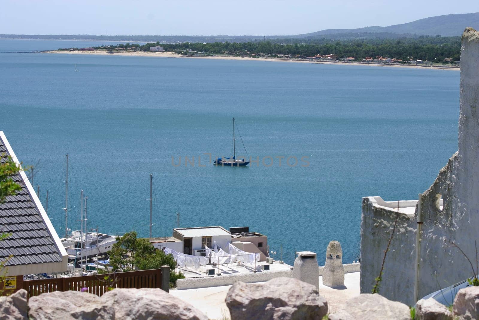 Bay of dreams at international tourism spot with sailing boat. Piriapolis, Maldonado, Uruguay.
