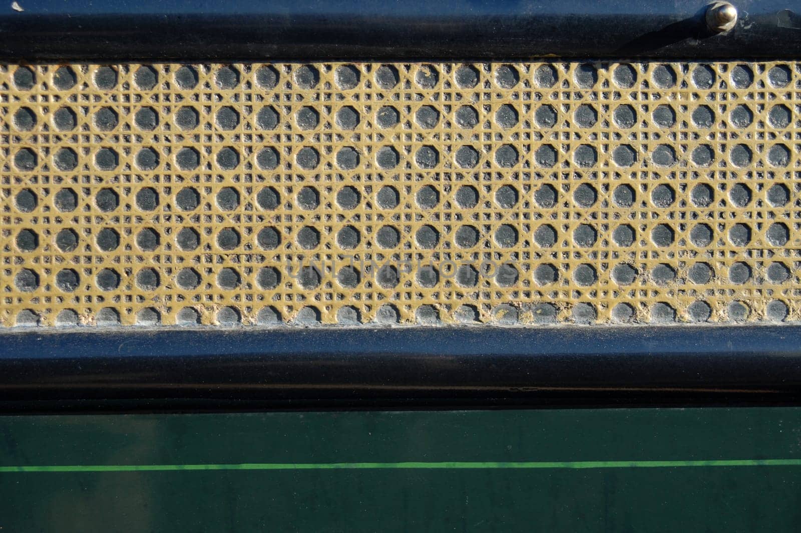 Rattan texture on the back of an old chariot. Retro background