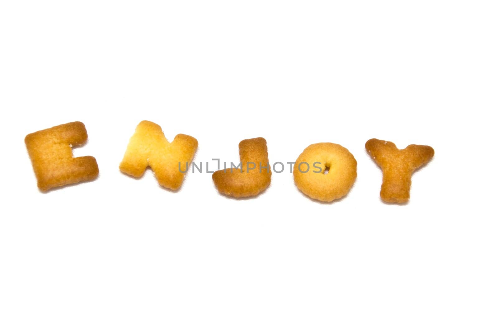 Biscuits letters. word "ENJOY"" on white background. isolated"