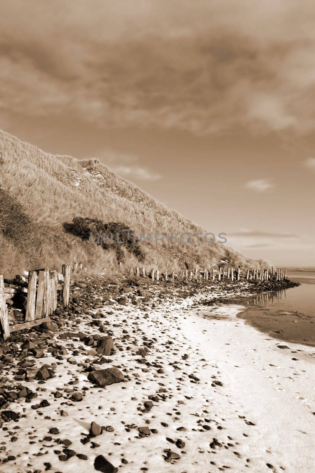 the cashen ballybunion frozen on a cold grey winters day in ireland in sepia