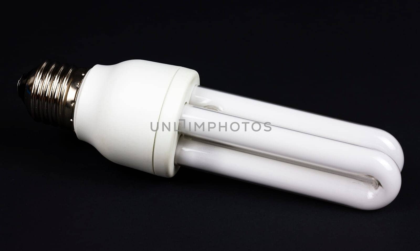 Energy efficiency, light bulb isolated over black
