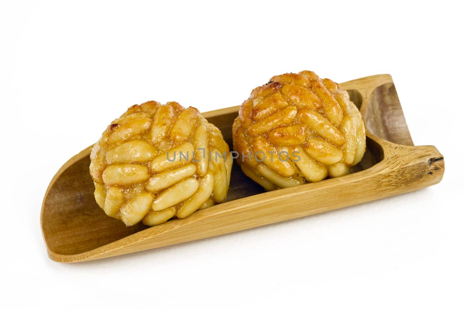 Panellet pine nuts isolated on white