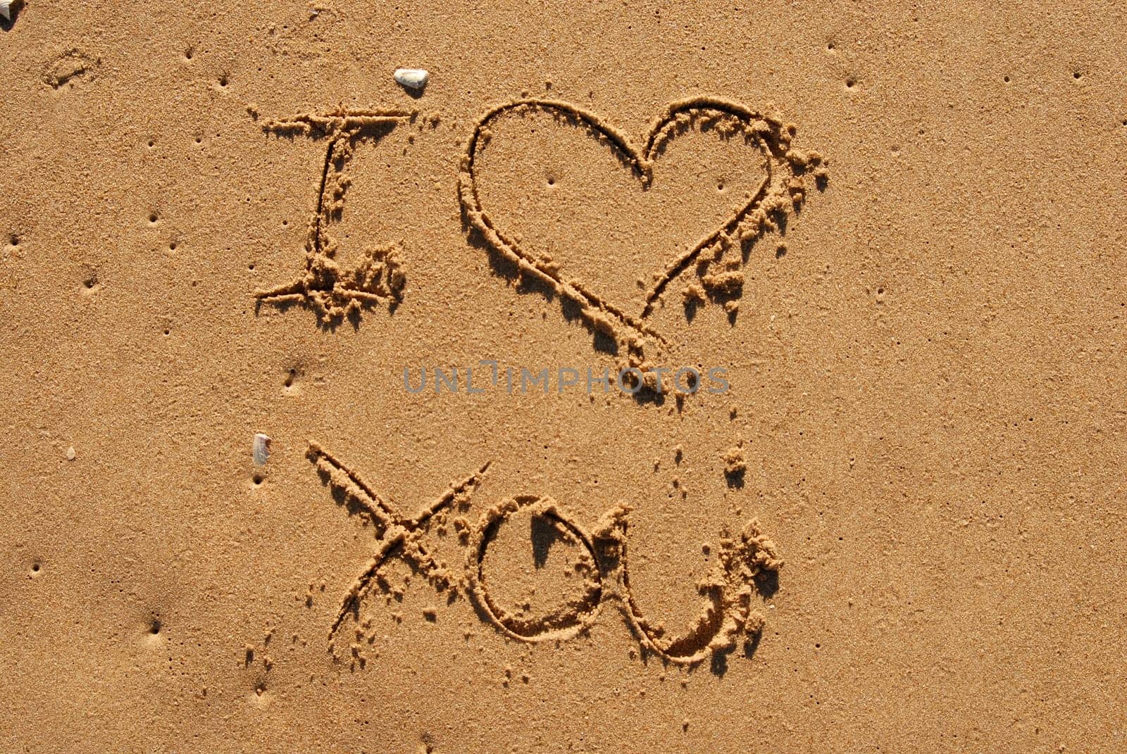 I love you written in the sand