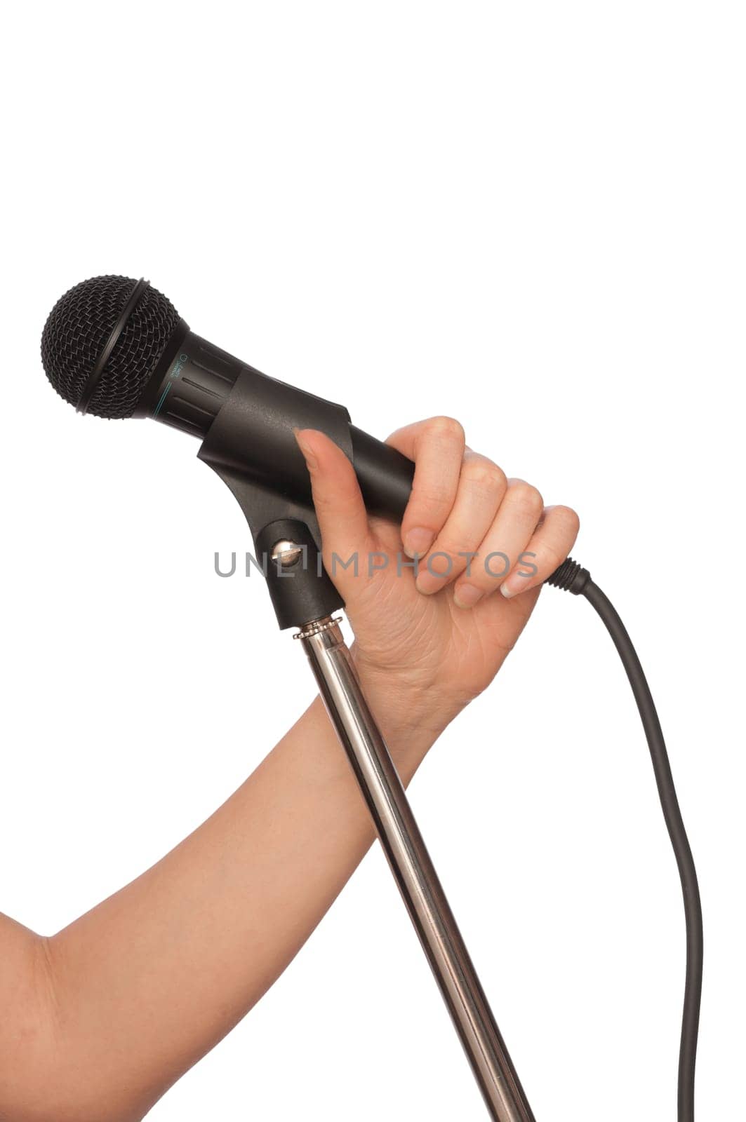 woman holding big black microphone for singing