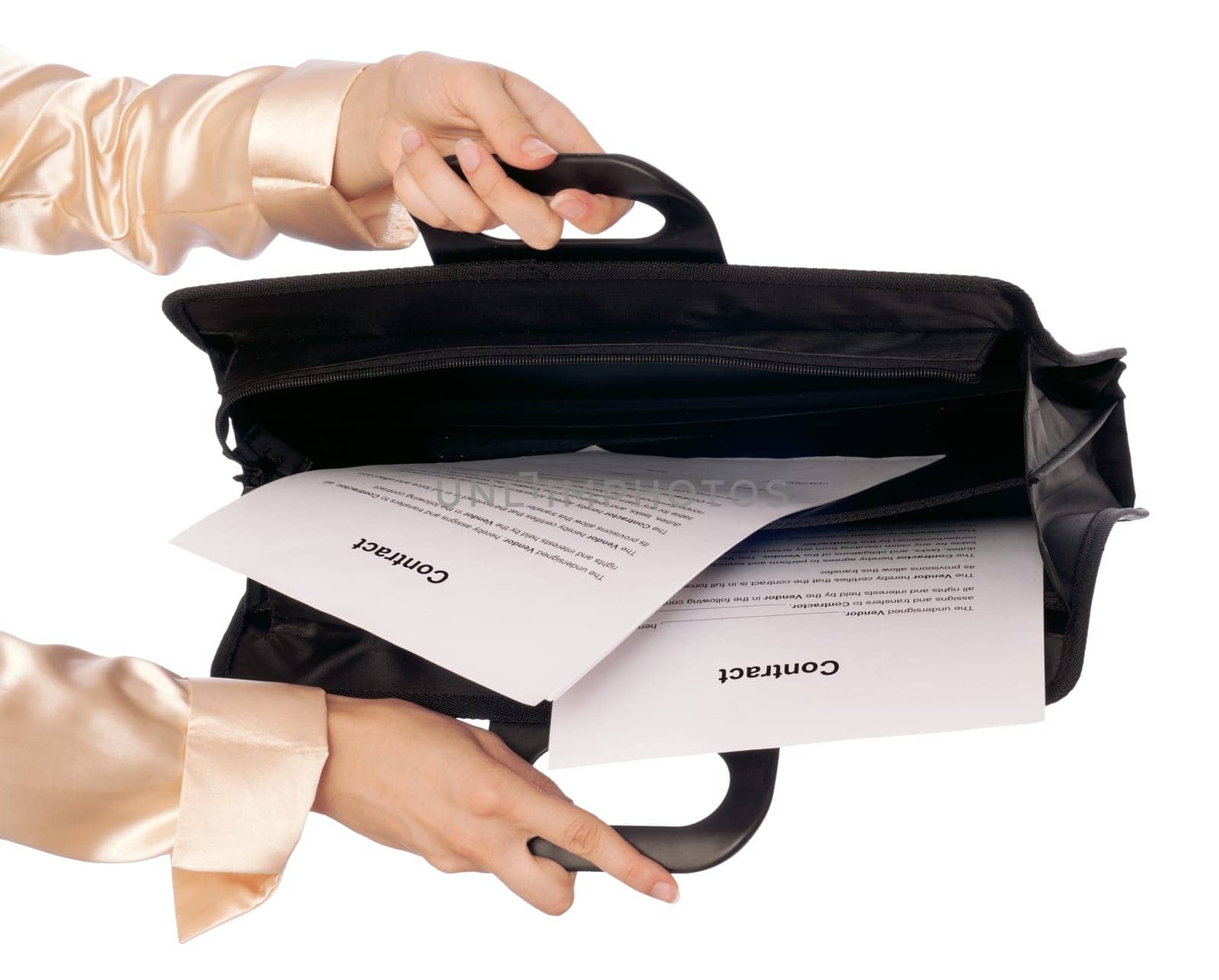 Businesswoman taking out from a suitcase contract for new employees