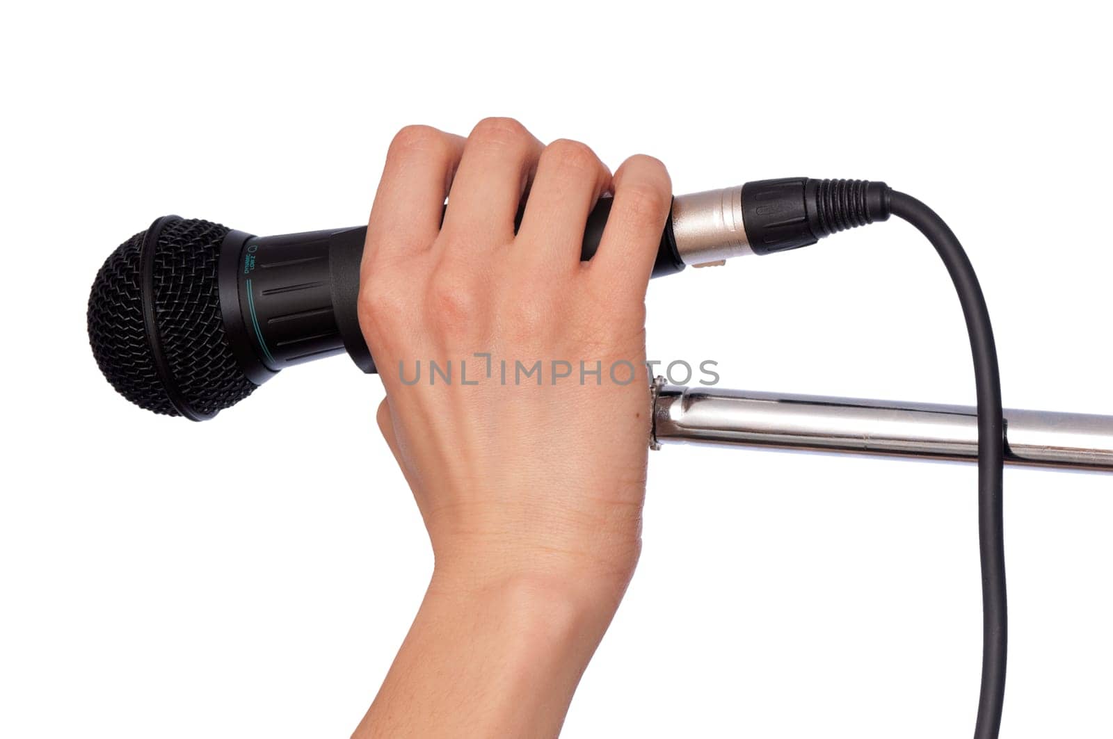 woman holding big black microphone for singing