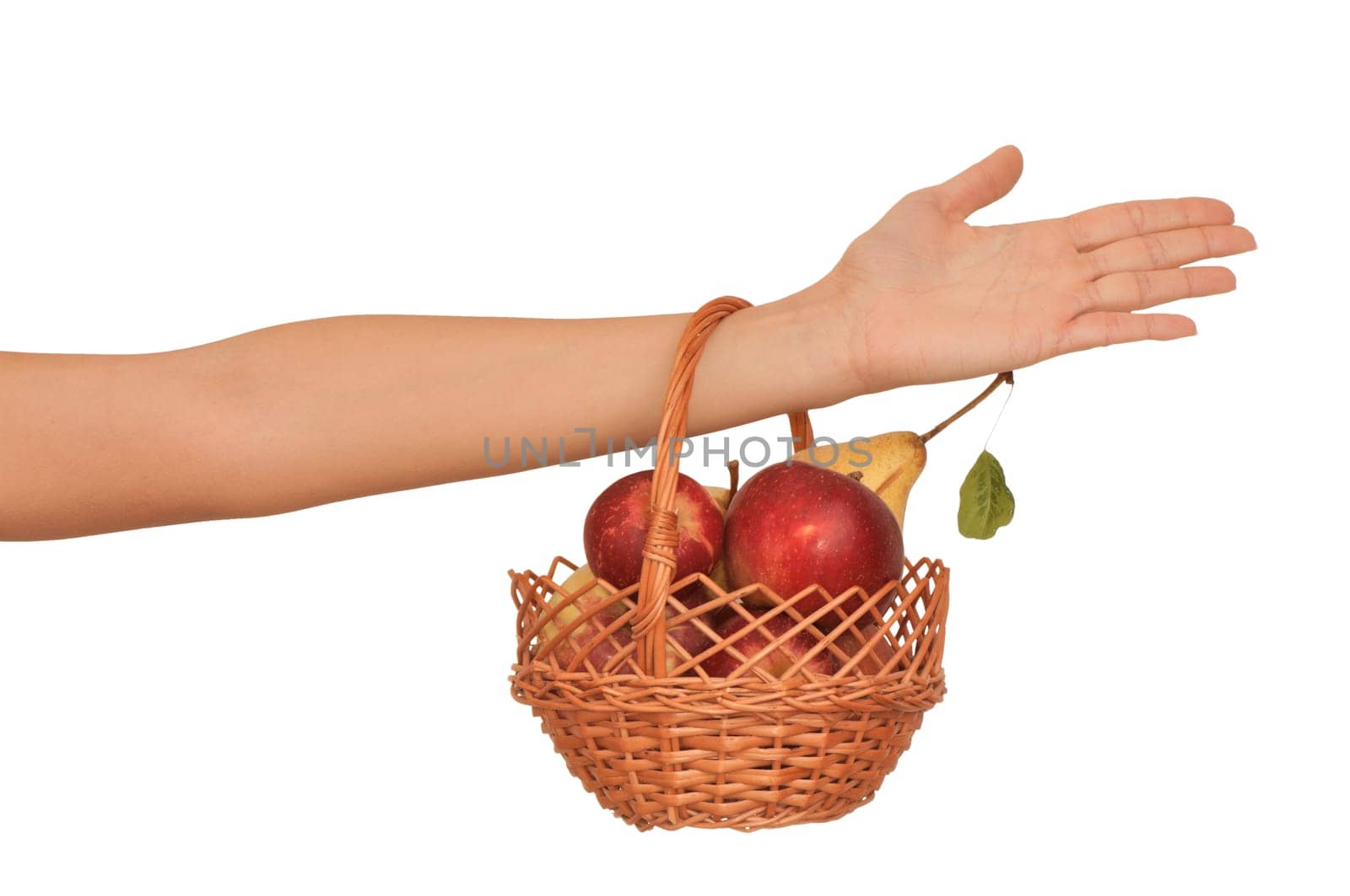 Basket with yellow pears and red apples from supermarket
