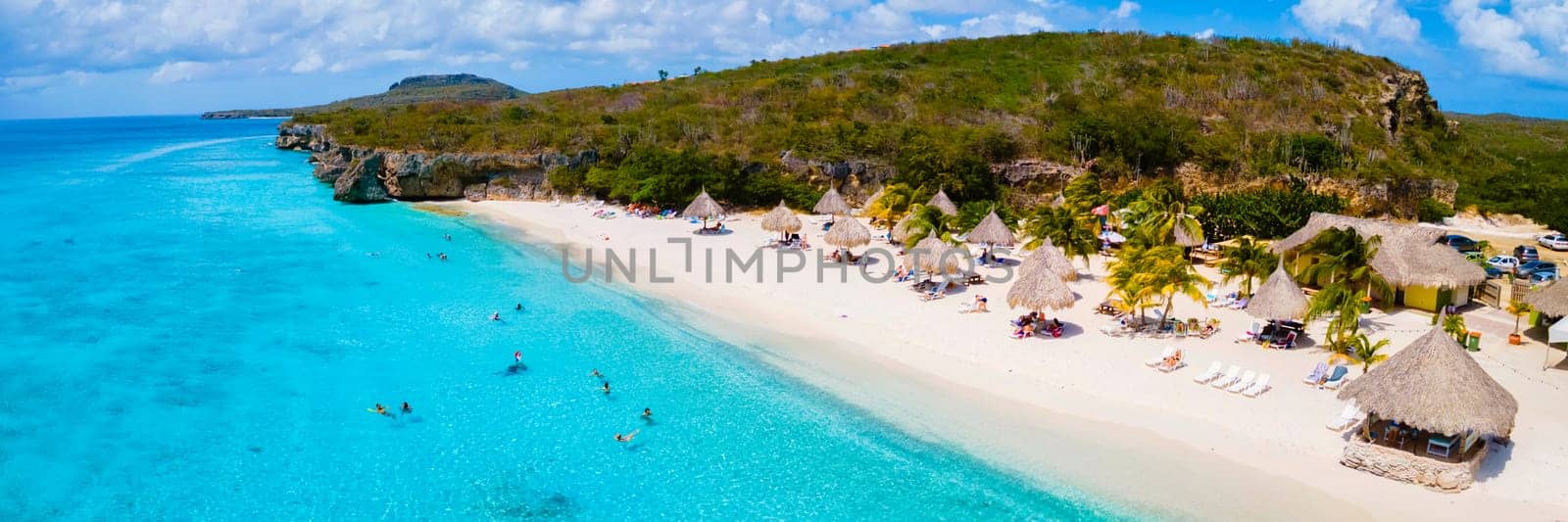 Cas Abao Beach Playa Cas Abao Caribbean island of Curacao, Playa Cas Abao in Curacao Caribbean tropical white beach with a blue turqouse colored ocean. view from above with drone at the beach