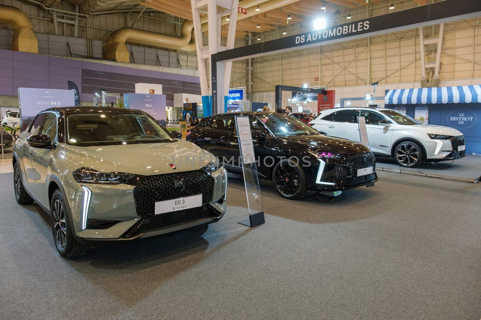 Lisbon, Portugal - May 12, 2023: DS 3 Electric, DS 4 and DS 7 hybrid cars on display at ECAR SHOW - Hybrid and Electric Motor Show