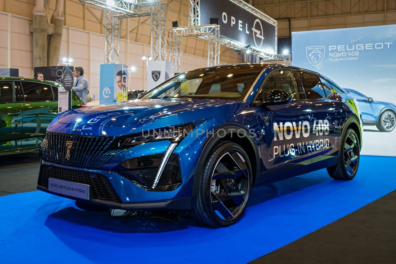 Lisbon, Portugal - May 12, 2023: Peugeot 408 plug-in hybrid electric car on display at ECAR SHOW - Hybrid and Electric Motor Show