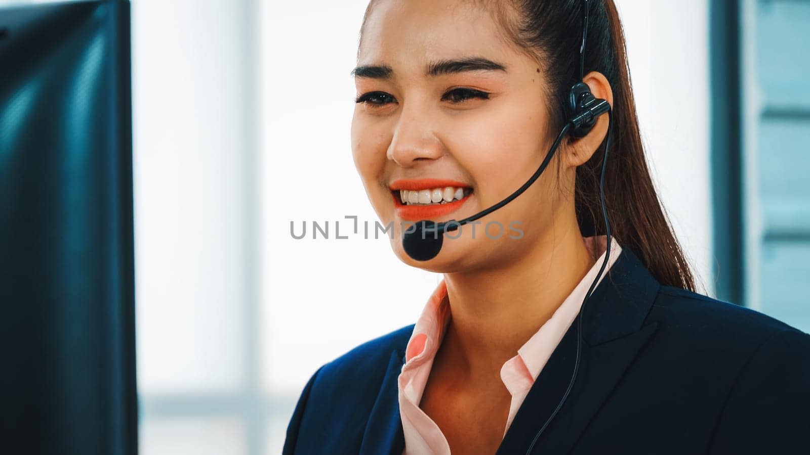 Business people wearing headset working in office Jivy by biancoblue