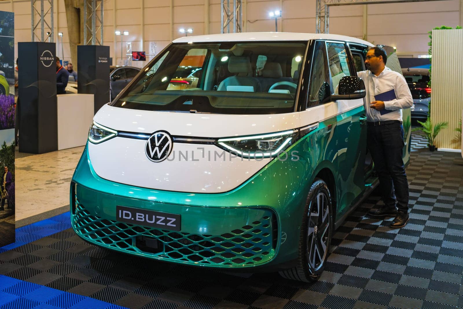 Lisbon, Portugal - May 12, 2023: VW ID.Buzz electric bus car on display at ECAR SHOW - Hybrid and Electric Motor Show