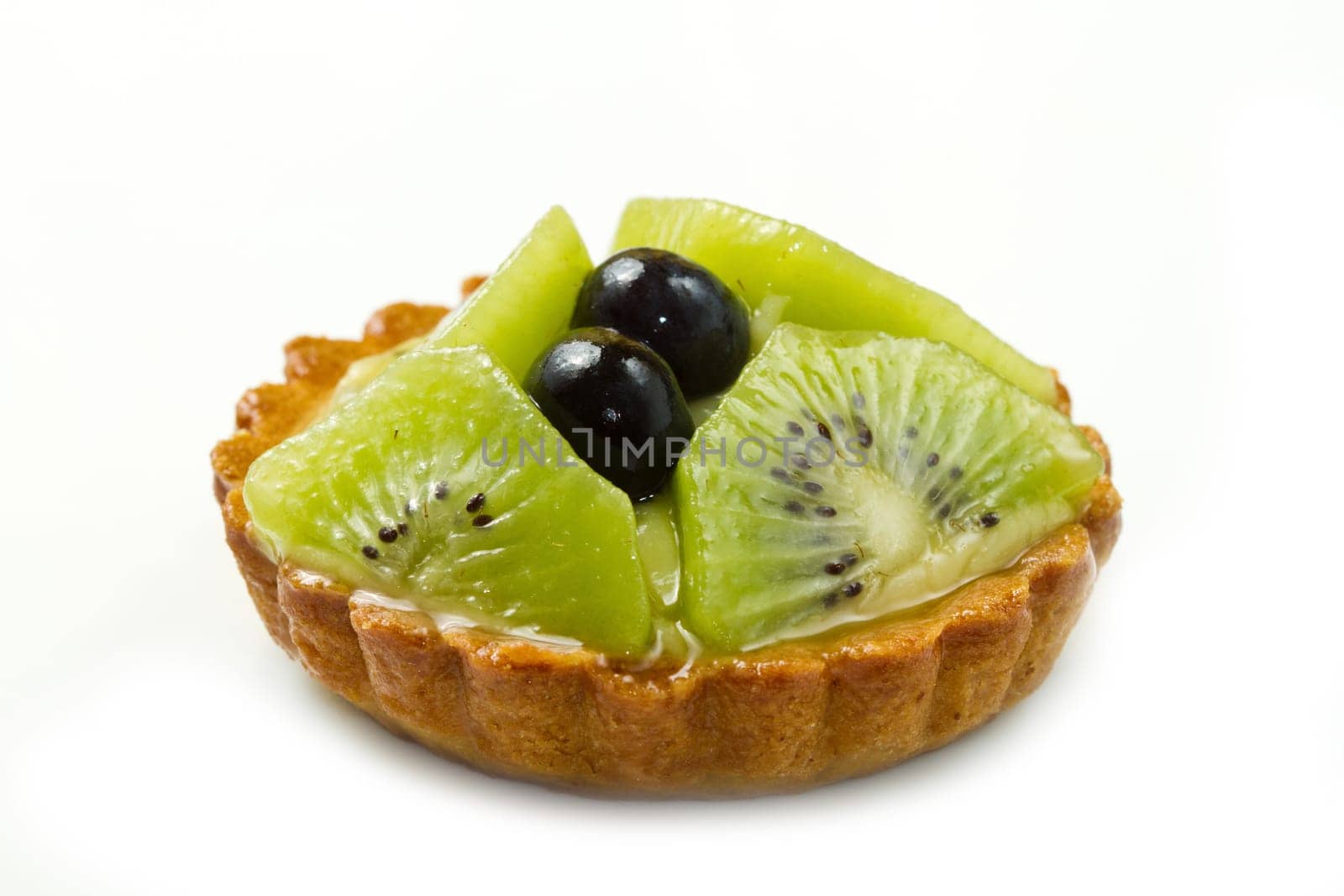 Fresh fruit tart on white background