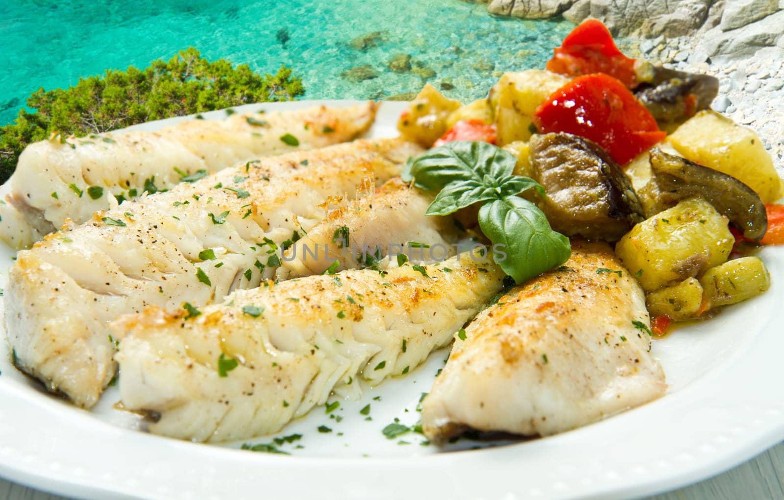 Tasty healthy fish fillet with vegetables