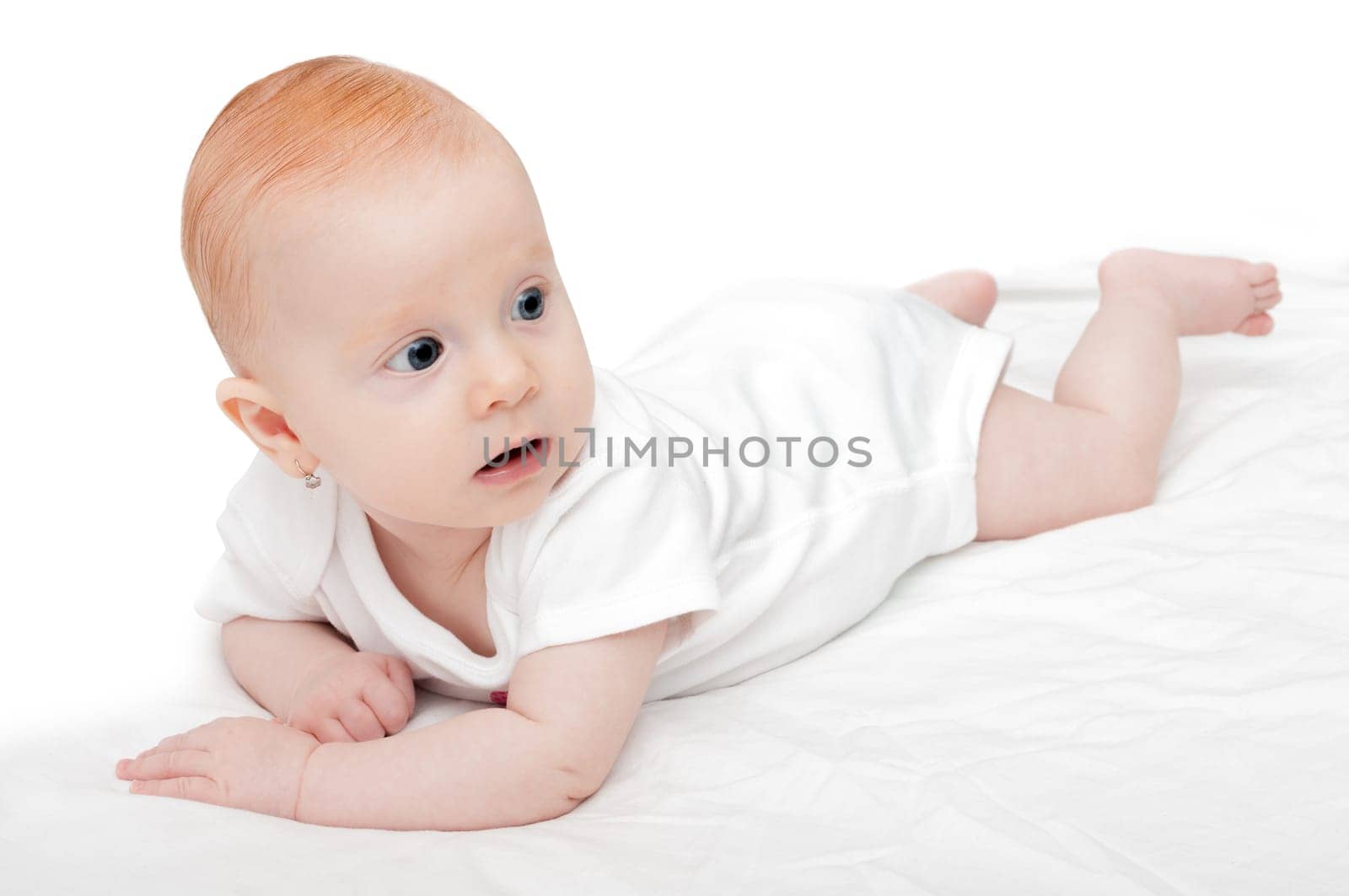 Cute Baby Girl Lying on Front on White Background