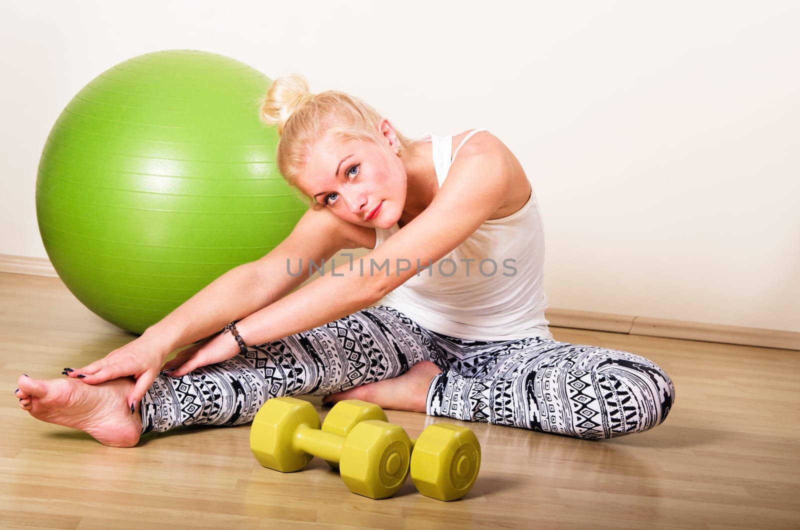 a young woman engages in aerobics