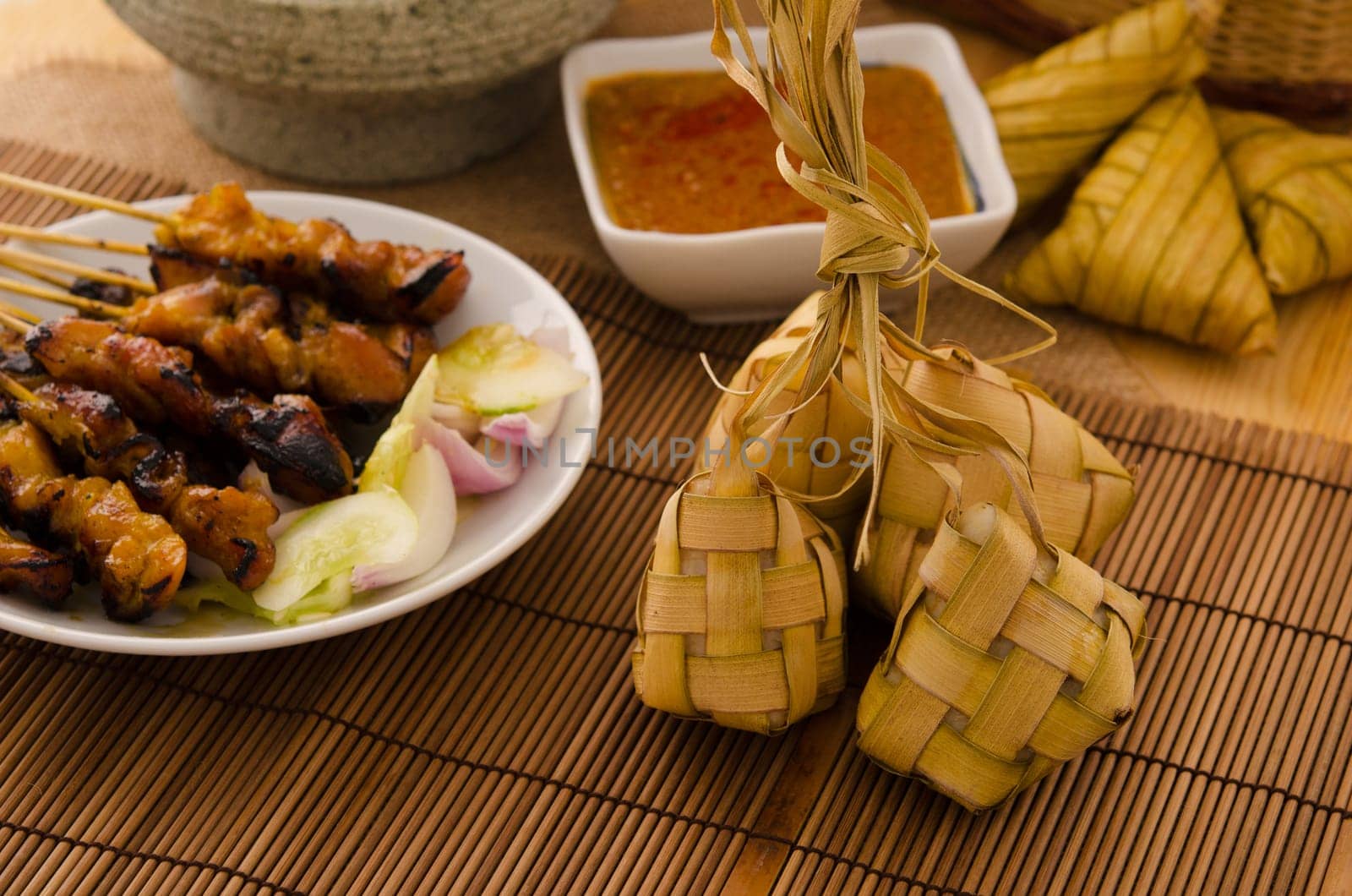 Ketupat: South East Asian rice cakes bundle, often prepared for festivities and celebratory occasions.