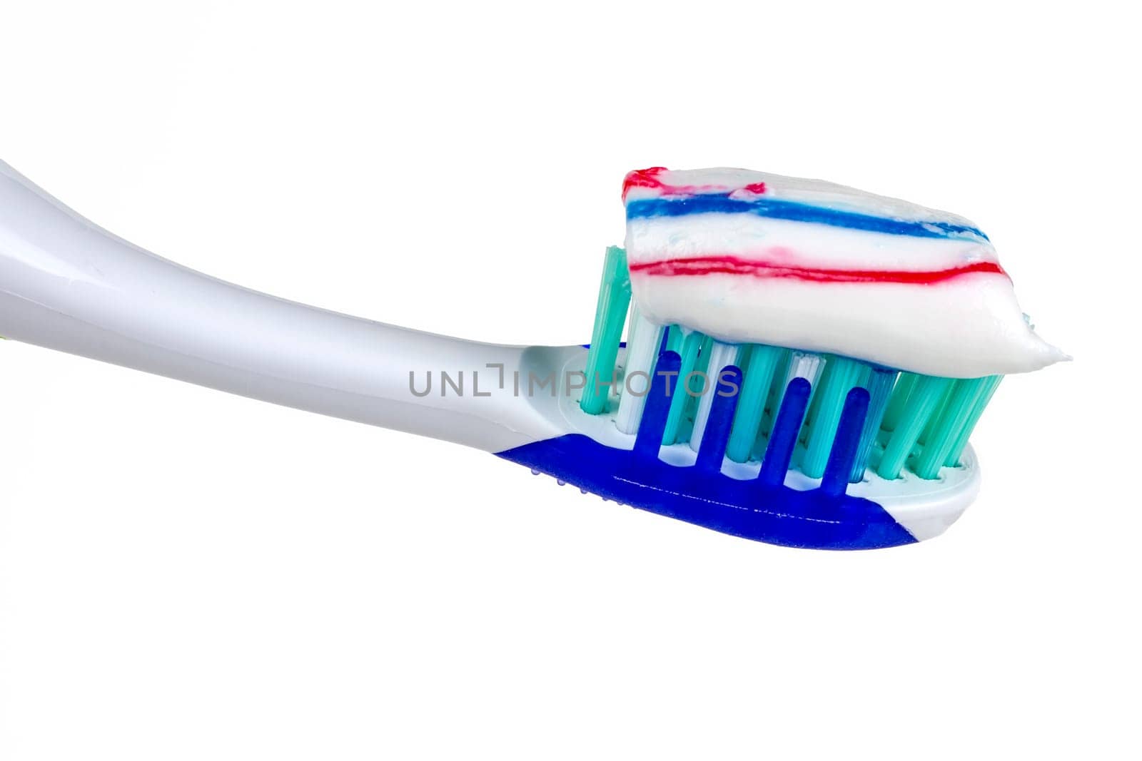 Tooth brush with tooth paste on white background