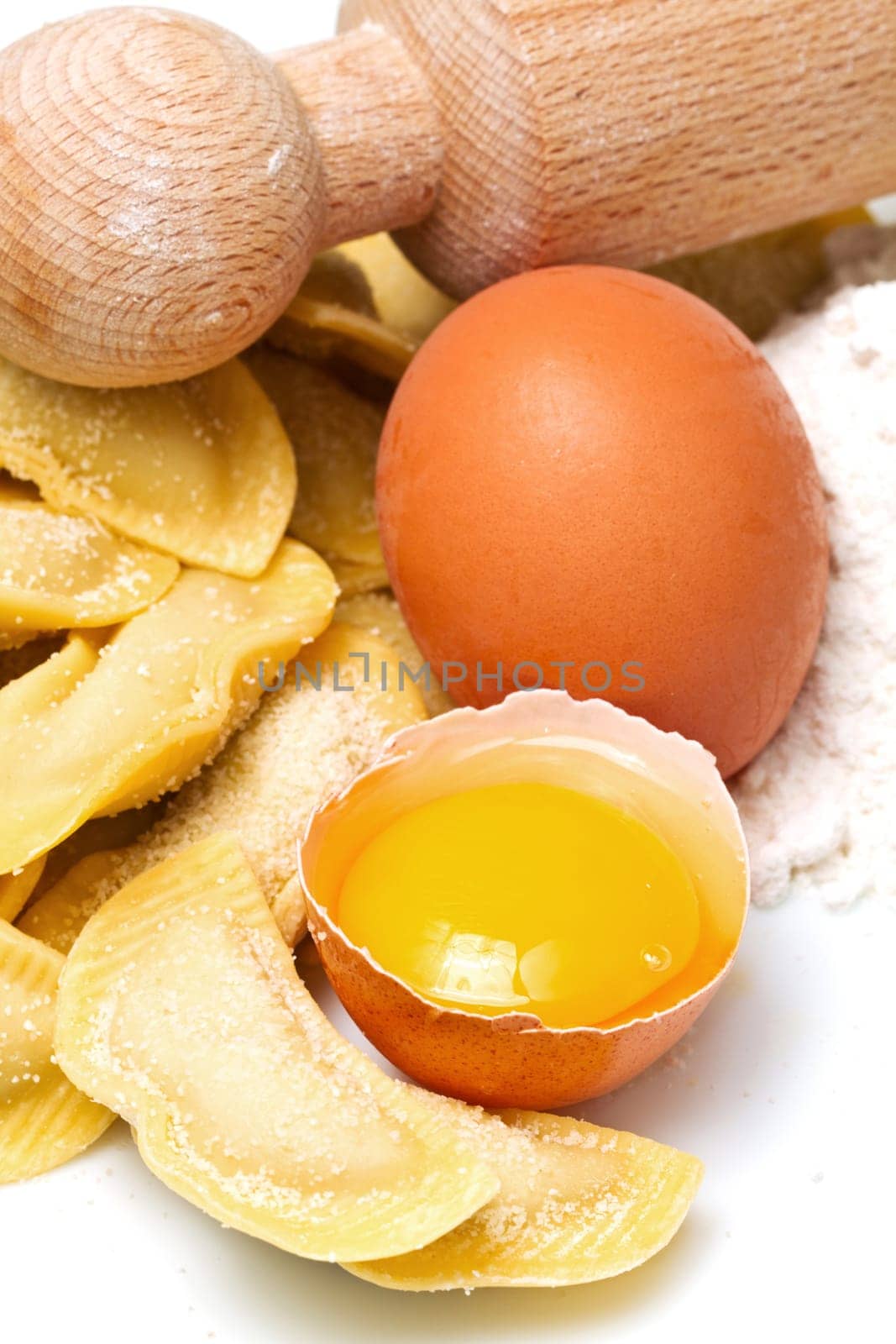isolated ravioli with ingredients on white background