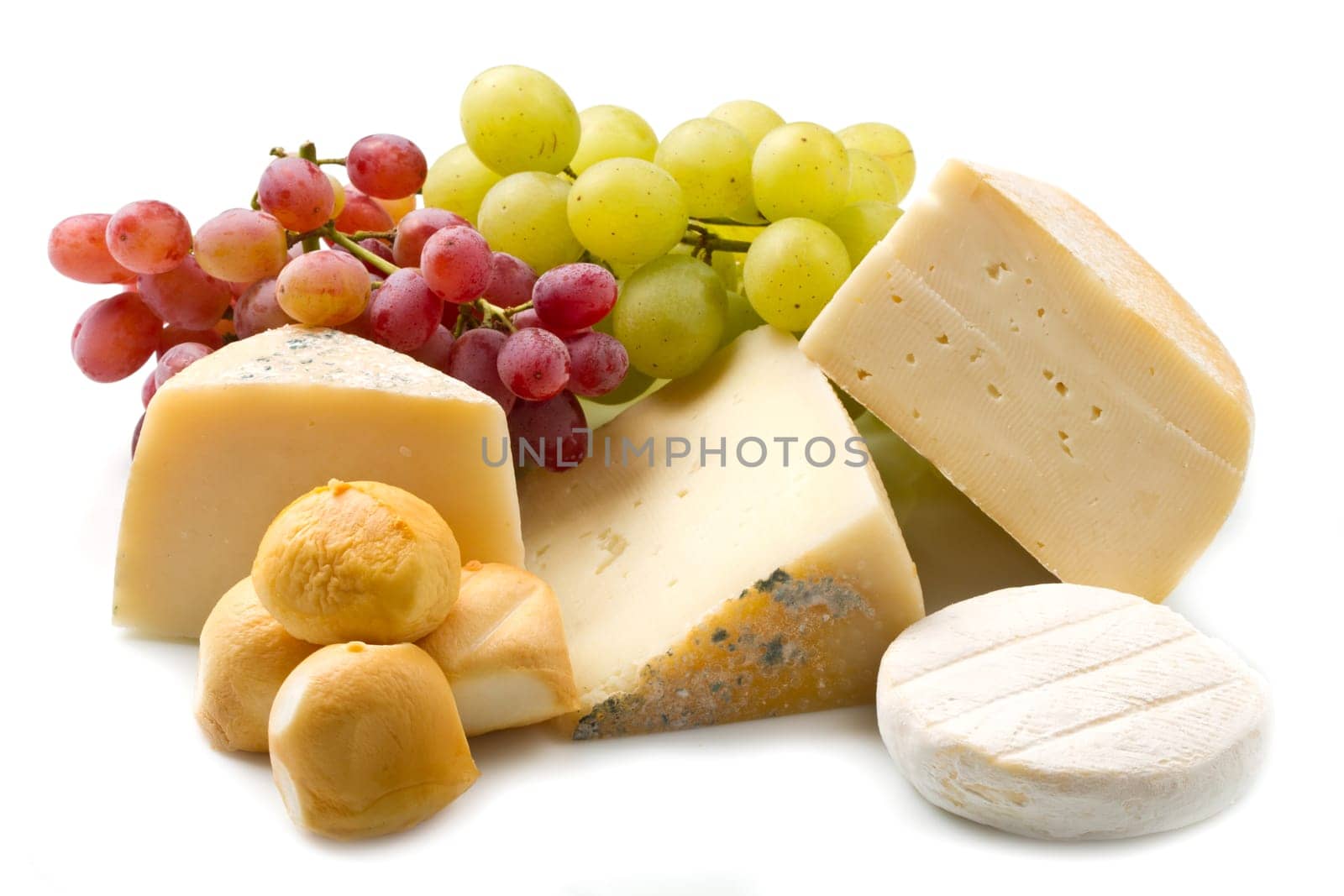 Cheese and grapes  isolated on white background