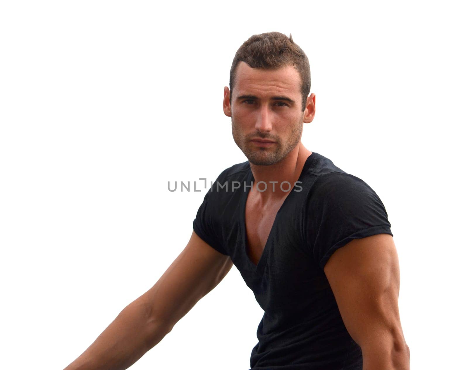 Fit and muscular male model on white background