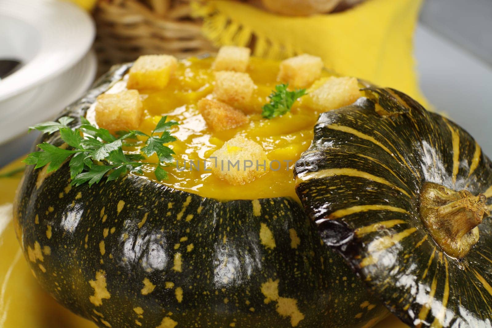 Freshly cooked pumpkin soup with crispy croutons ready to serve.
