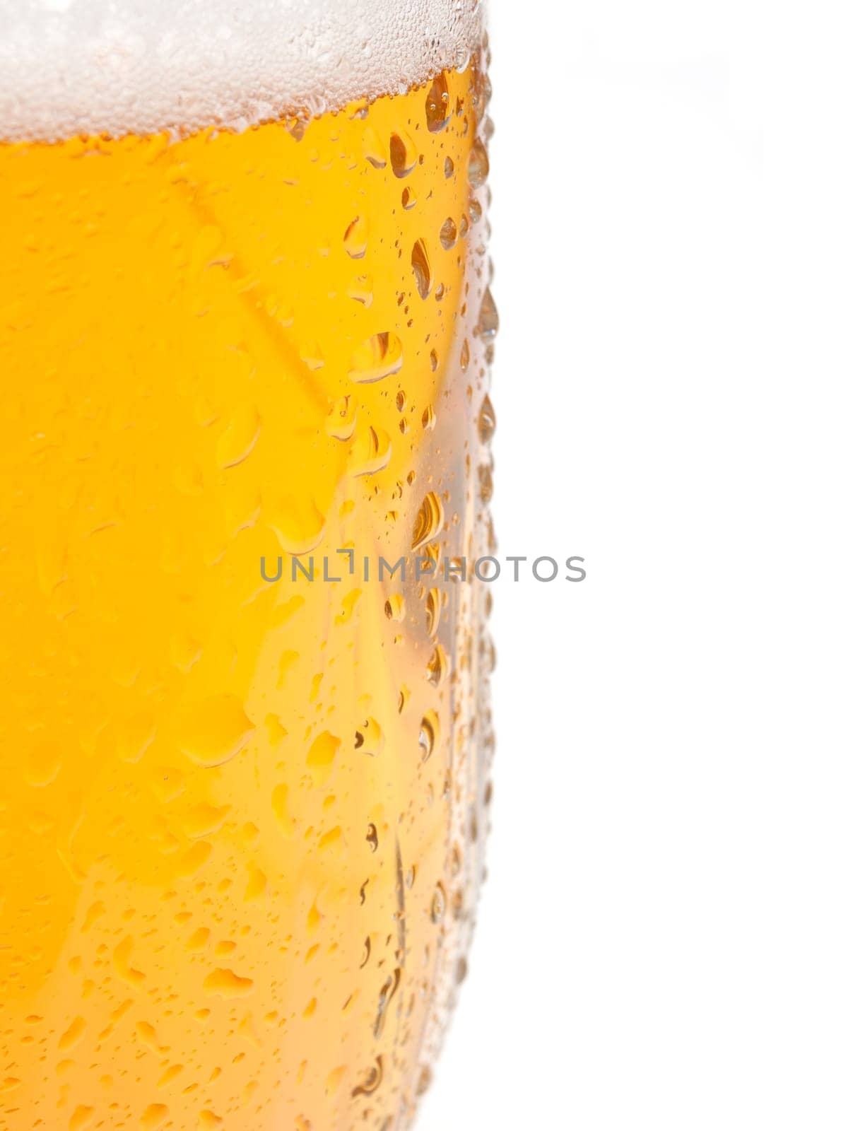 Closeup of Glass of Draught Beer on White Background