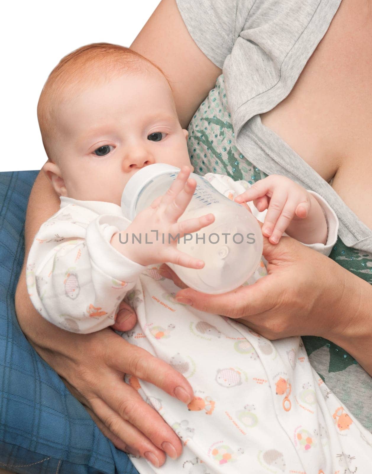 Closeup of  Baby Girl Feeding With a Bottle of Milk