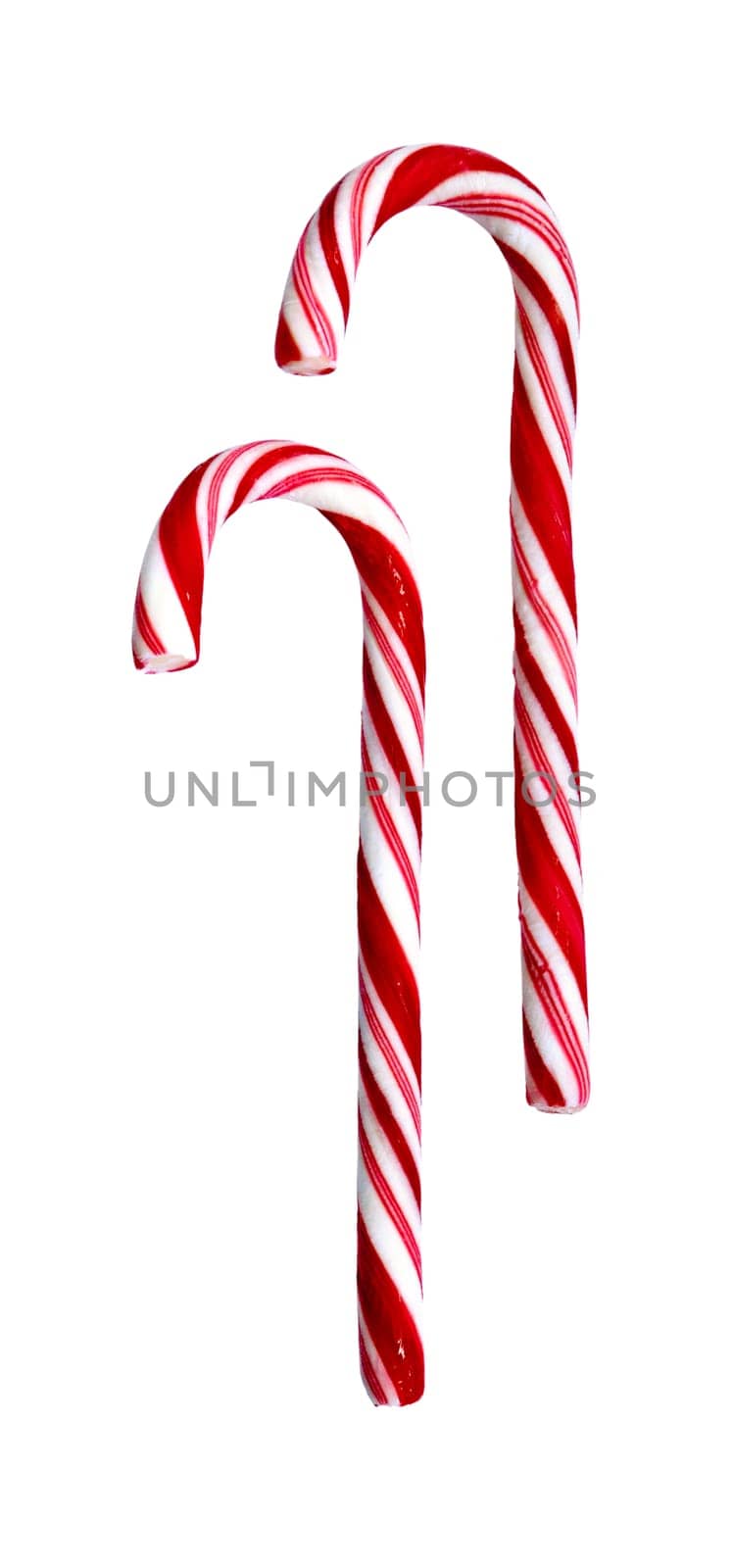 Two candy canes isolated on white background. Christmas, holiday concept. Space for copy. Useful as greeting card. Clipping path included.