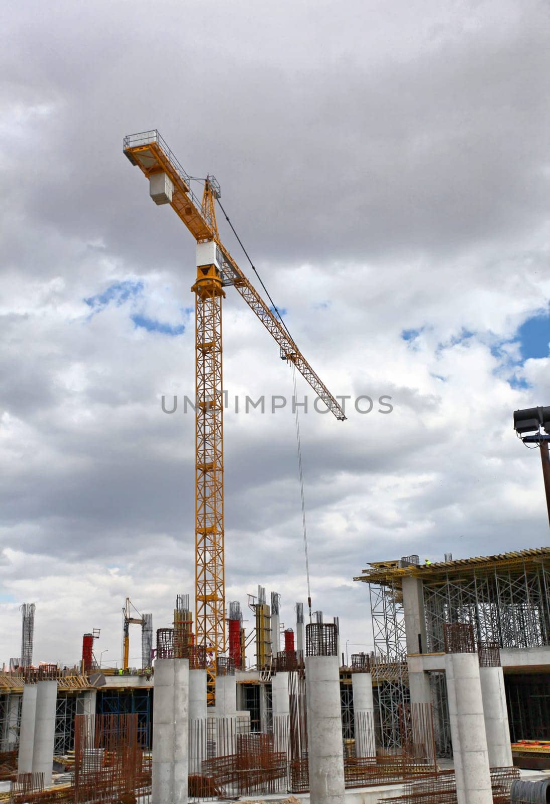 Construction workers working on scaffolding