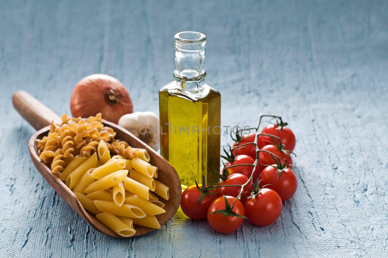 Cooking ingredients on blue background close up