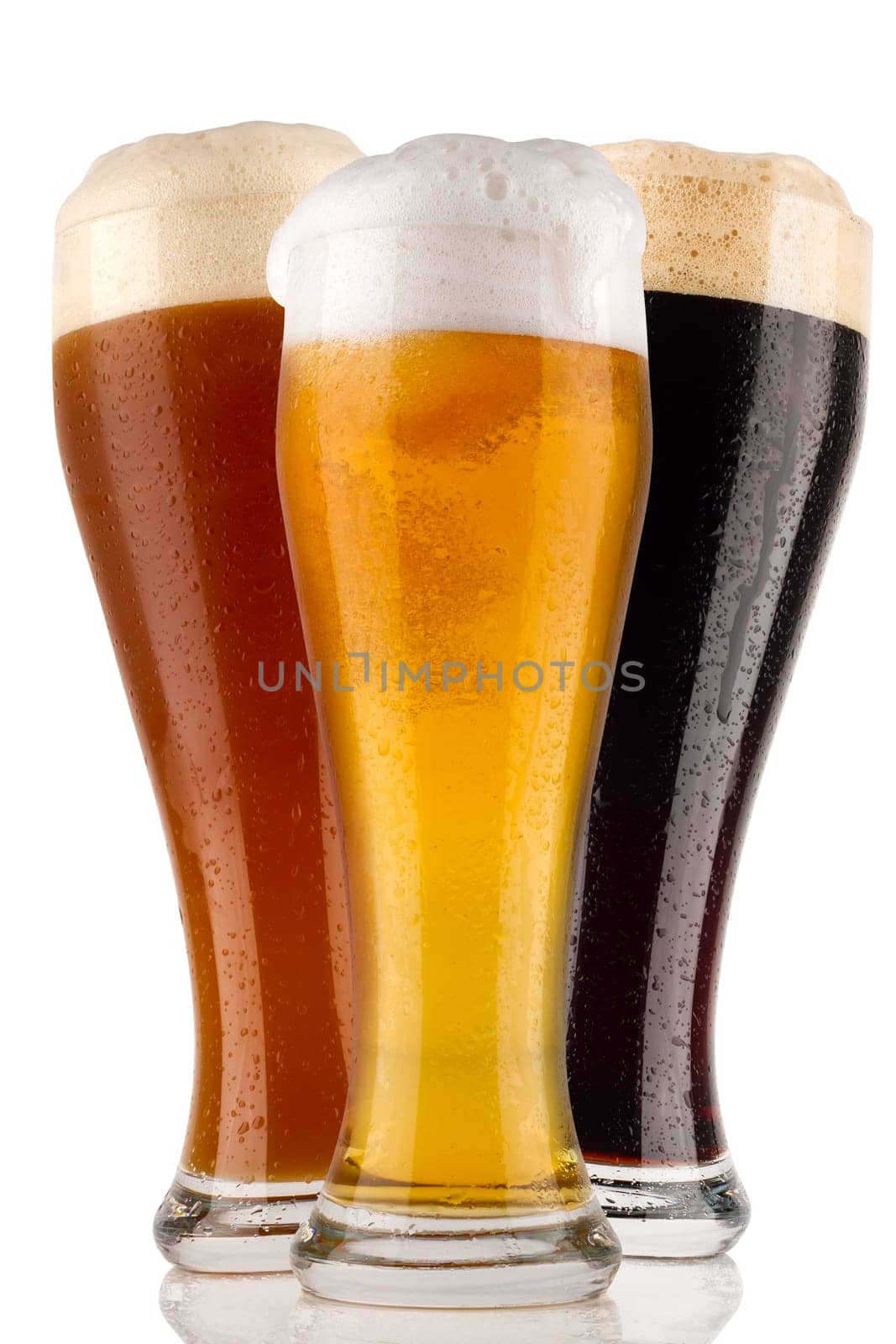 Various wheat beers on white background