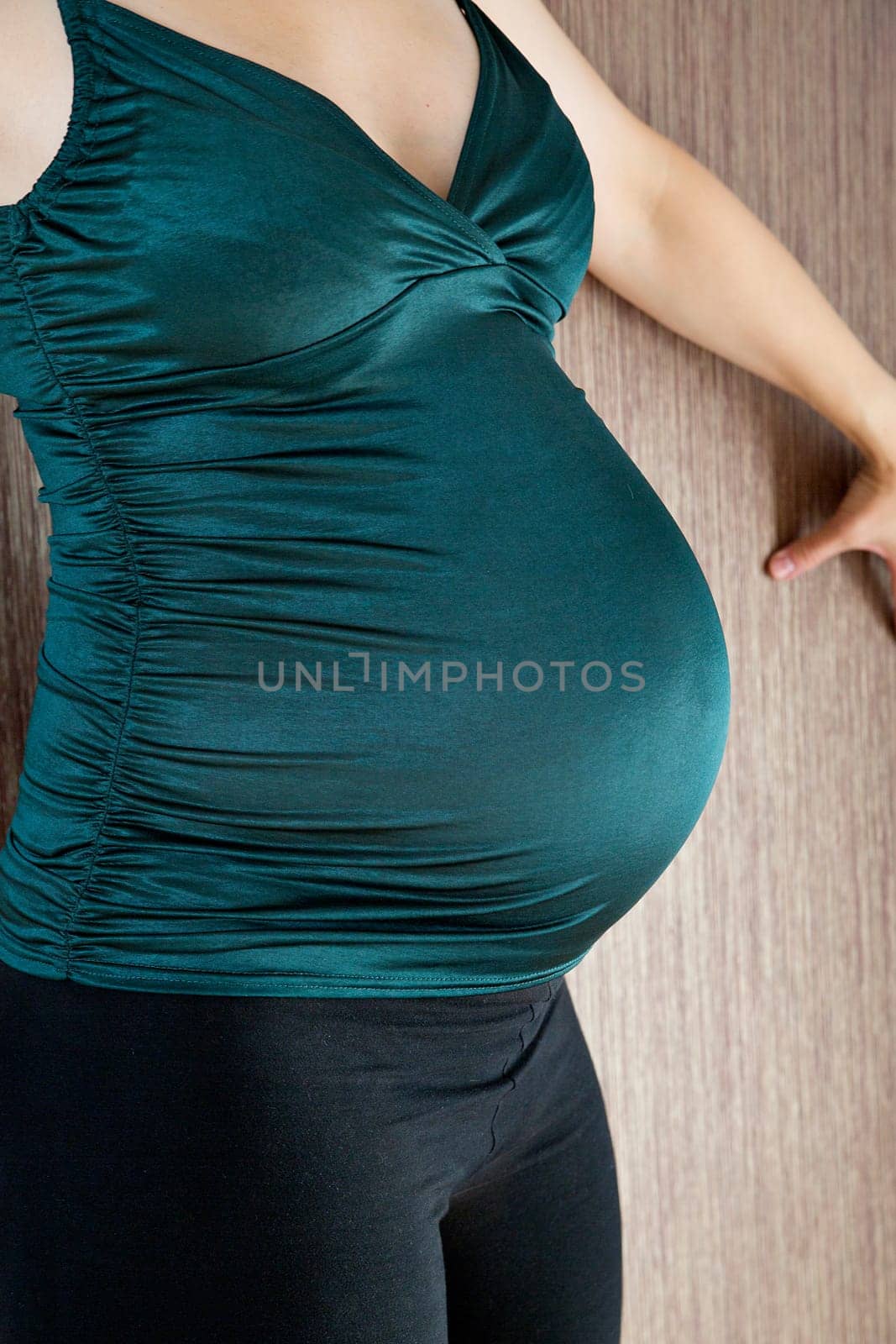 Pregnant woman belly before soon coming child birth