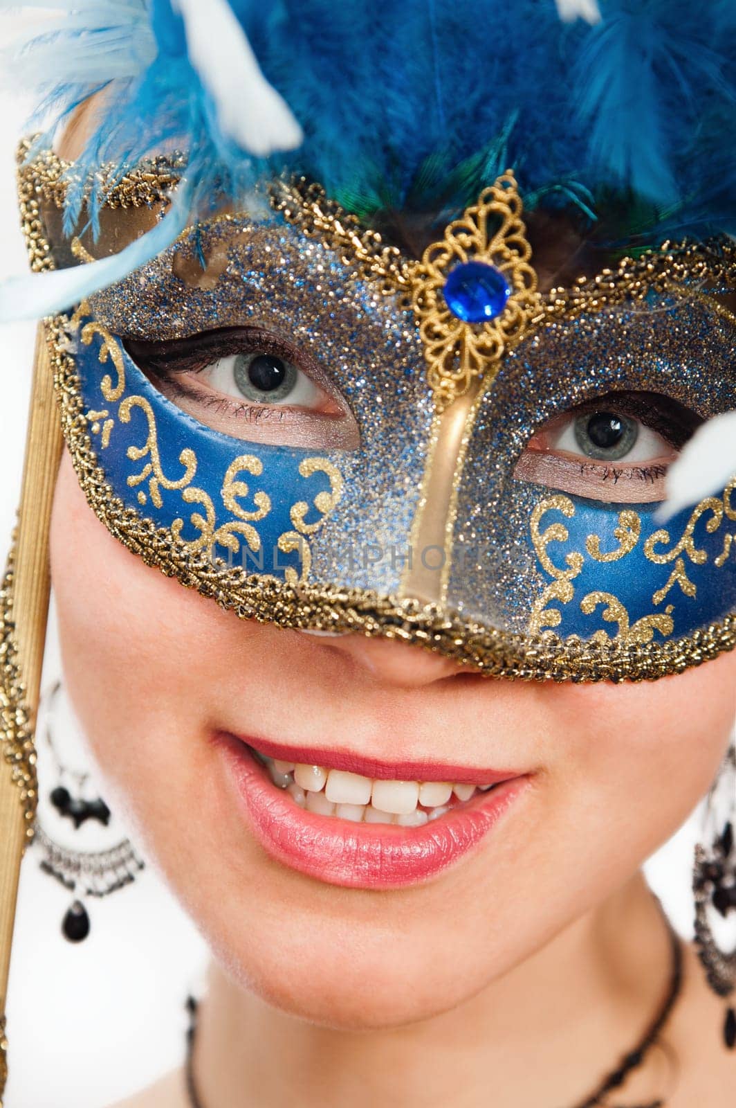young woman in Carnival mask