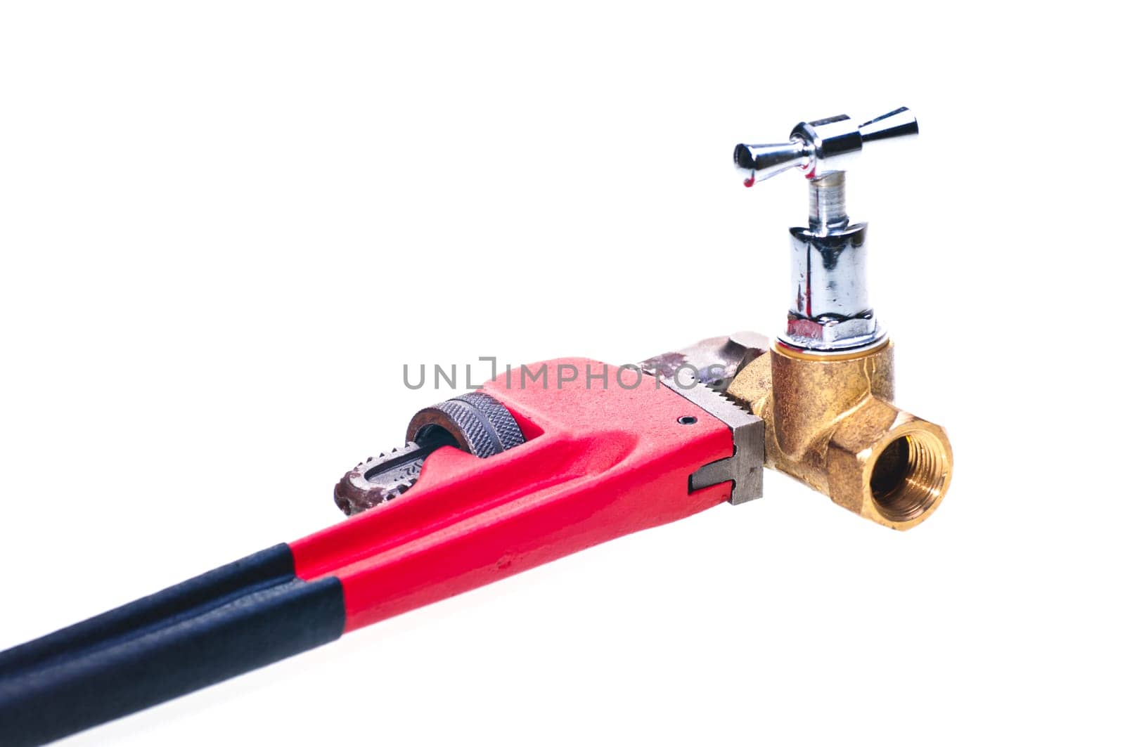 Pipe wrench holding brass pipe fixture