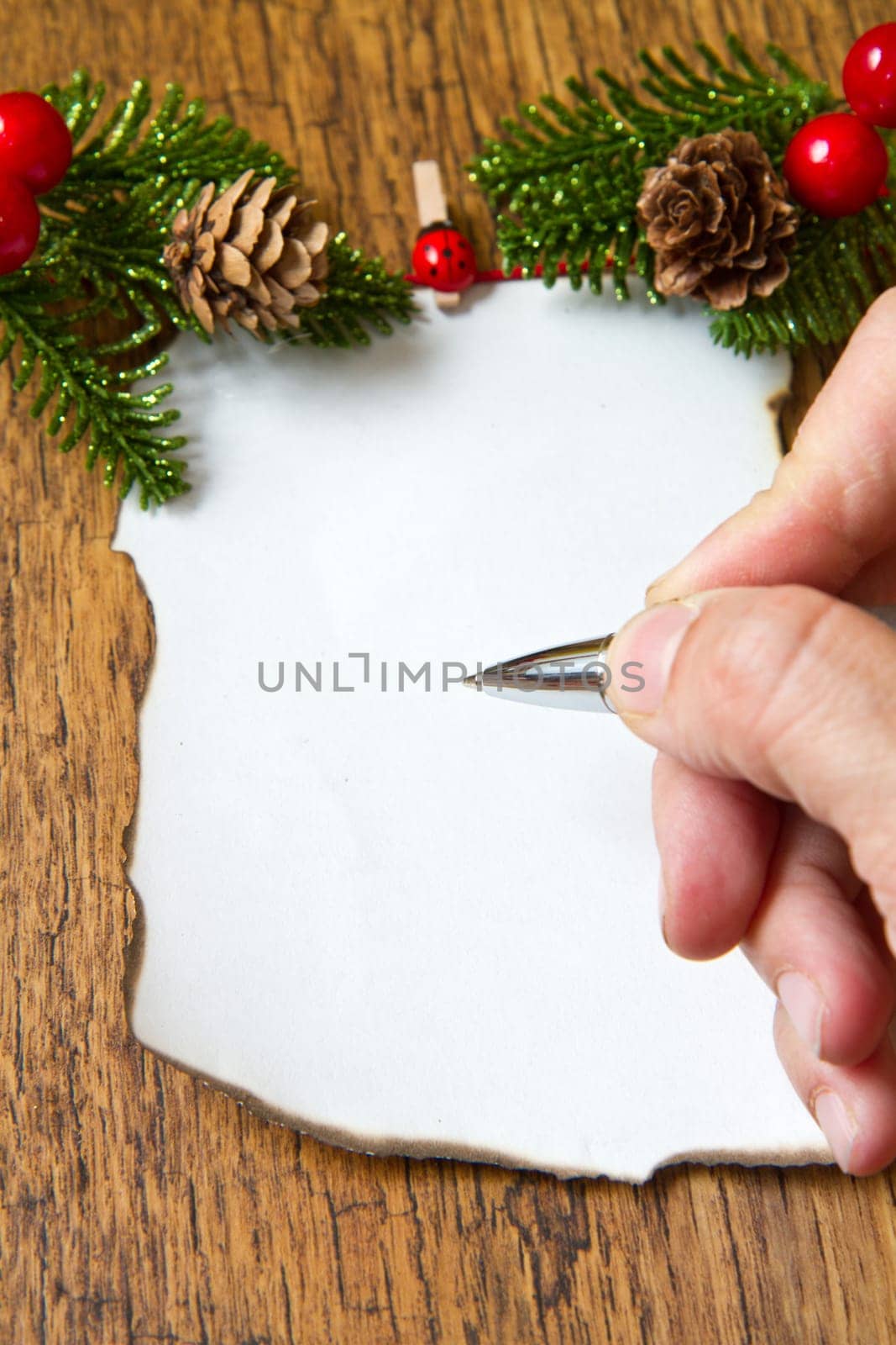 blank note with christmas decoration on wooden background