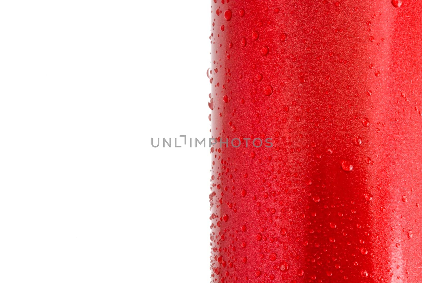 Water droplets on a red shiny metal surface, closeup